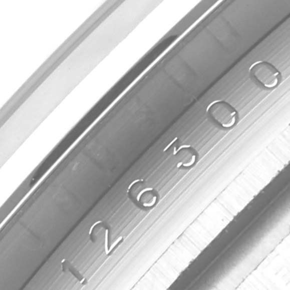 This image shows a close-up angle focusing on the serial number engravings inside the bezel of the Rolex Datejust 41 126300 Men
s Stainless Steel Blue Dial 126300 Men
s Stainless Steel Blue Dial watch.