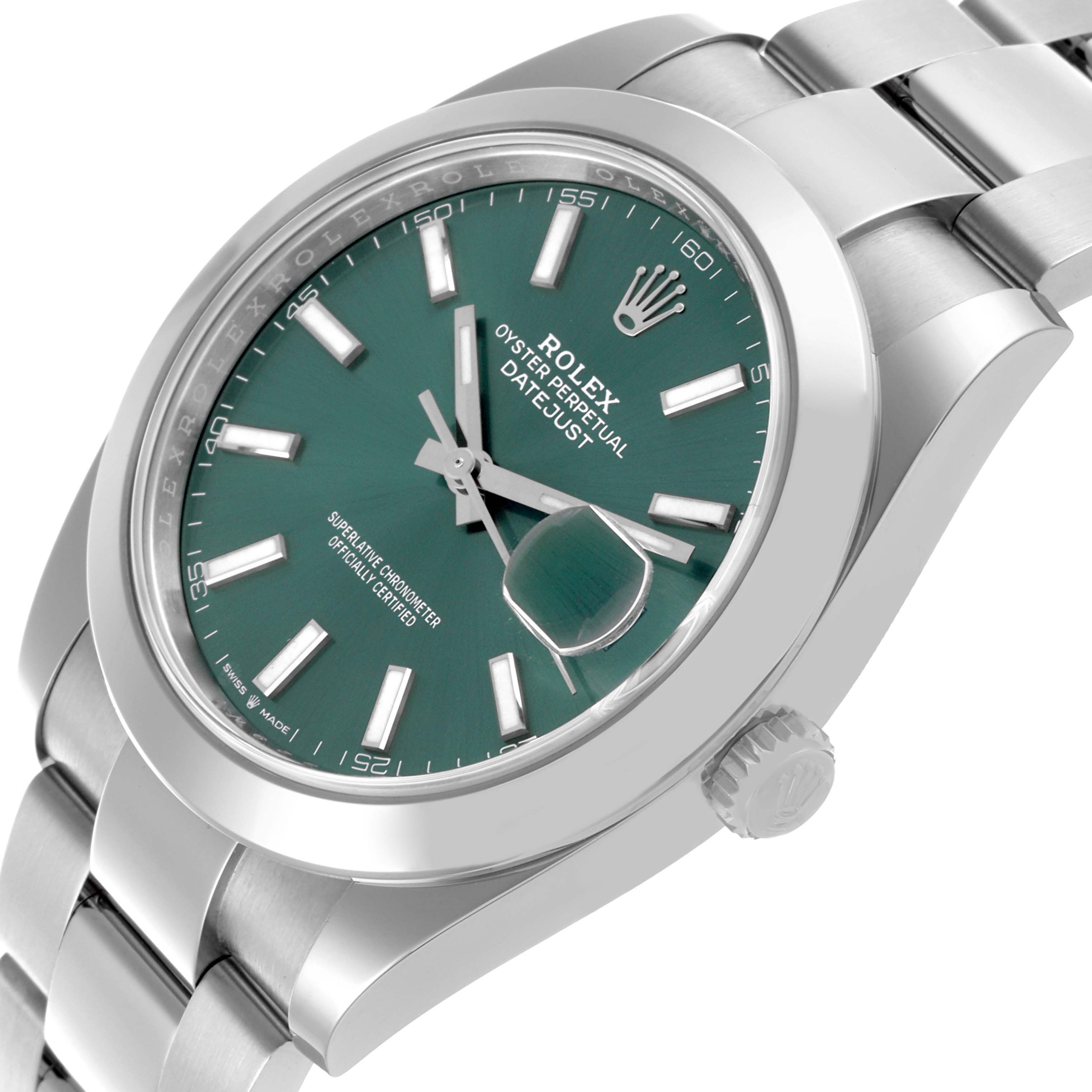The Rolex Datejust 41 126300 Men's Stainless Steel Green Dial is shown at an angled close-up, highlighting the green dial, bezel, and bracelet.