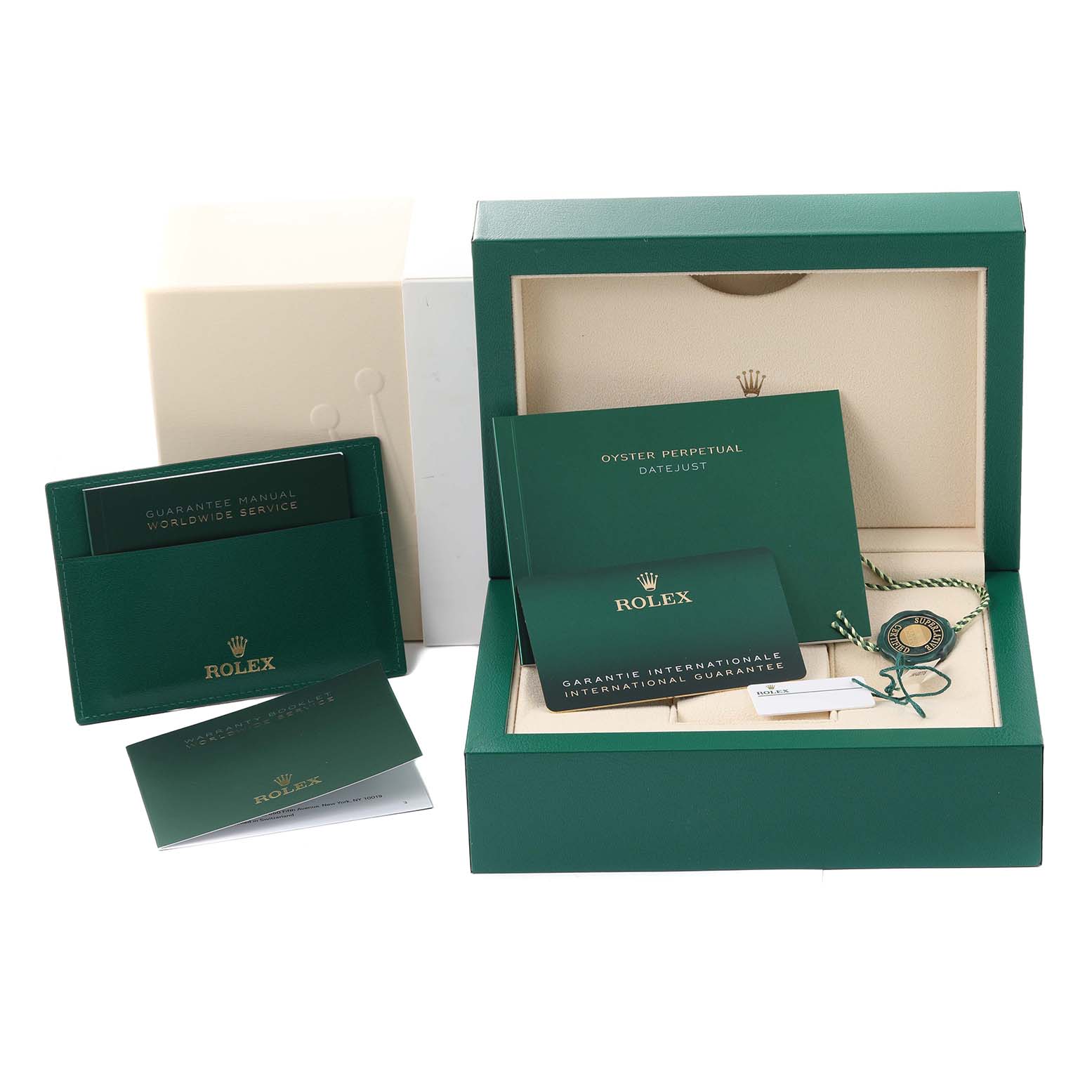 The image shows the packaging and documents of a Rolex Datejust 41 126334 Men's Stainless Steel White Dial 126334 Men's Stainless Steel White Dial watch, including a green box, manuals, and a warranty card.