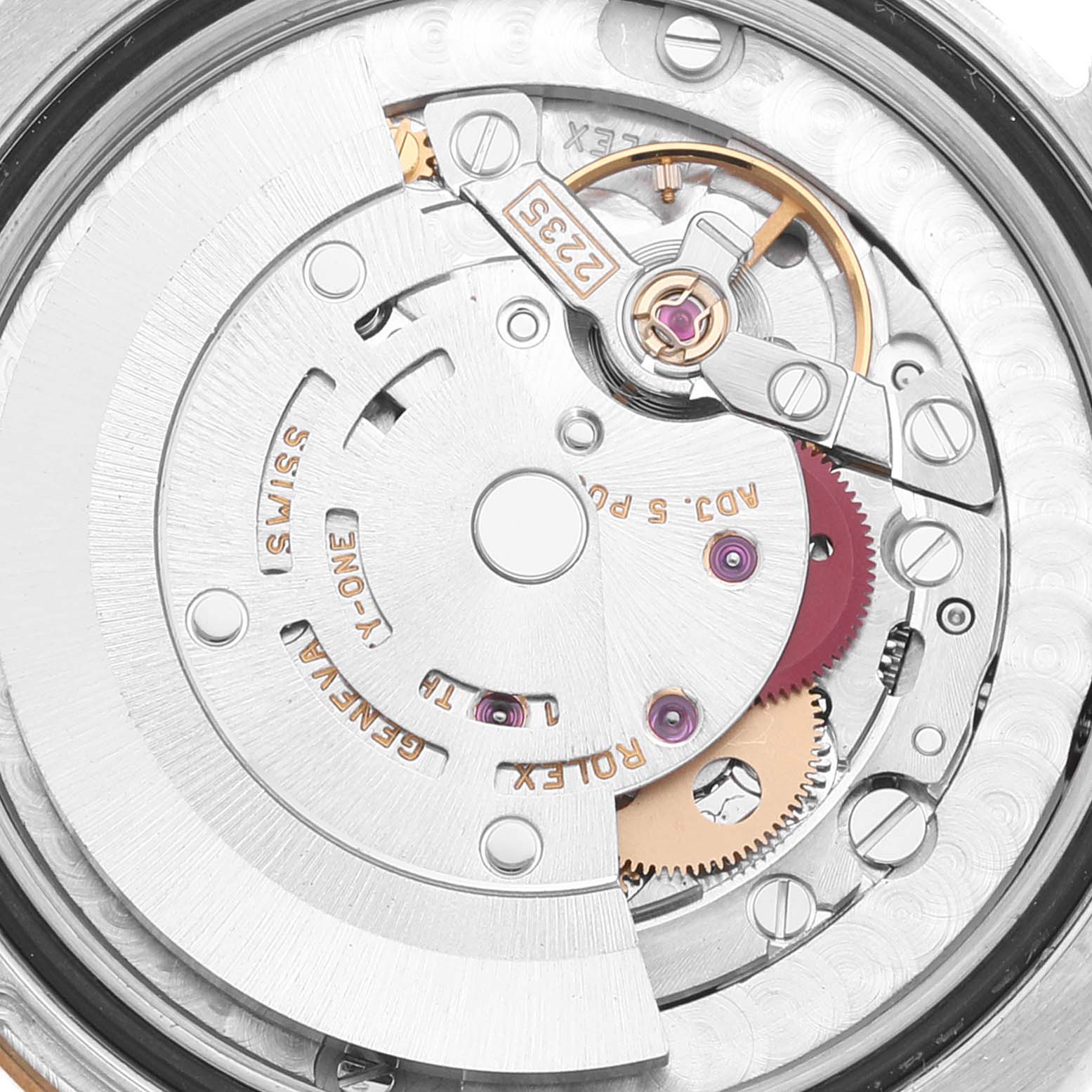 This image shows the intricate movement mechanism of a Rolex Mid-Size 178273 Women's Steel and Gold (two tone) Silver Dial 178273 Women's Steel and Gold (two tone) Silver Dial model watch from a close-up angle.
