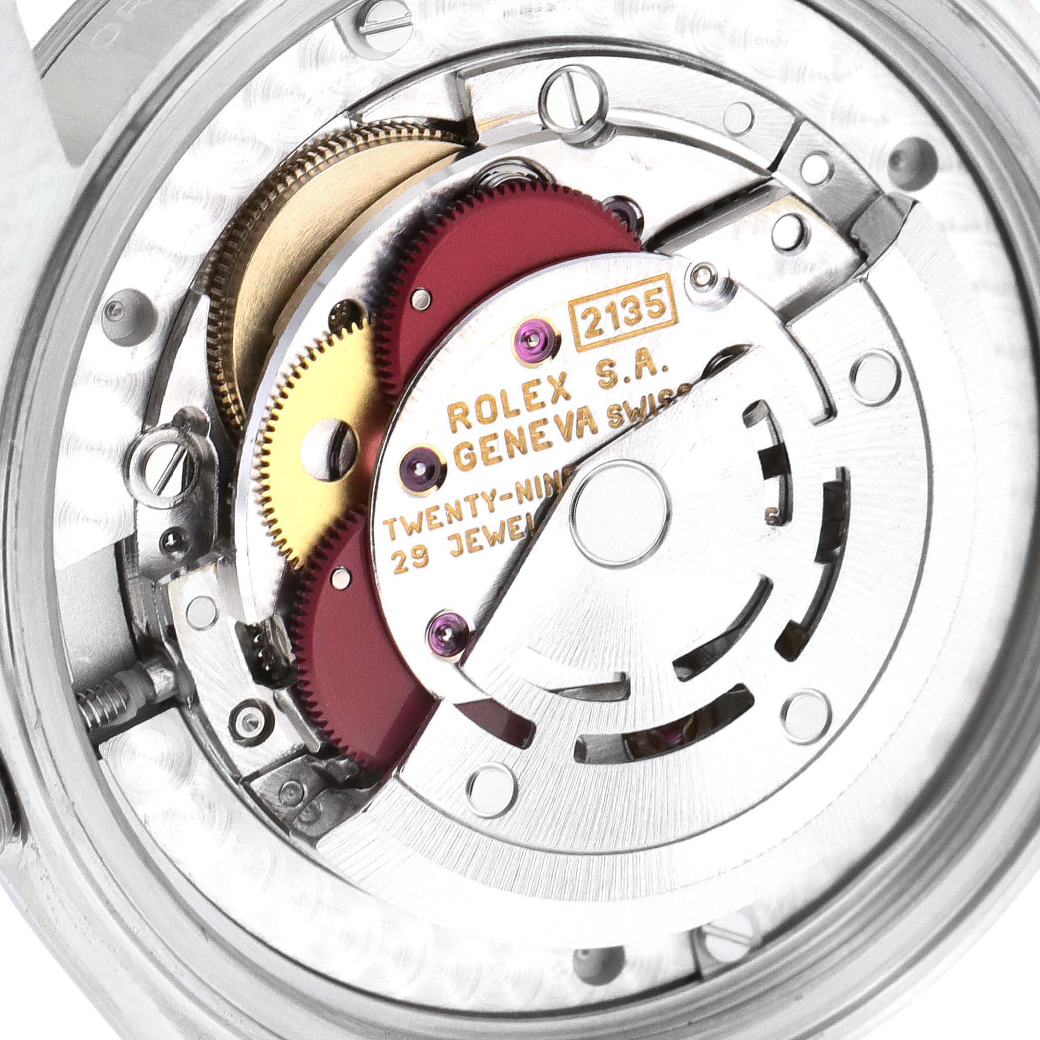 This close-up image shows the intricate internal mechanics of a Rolex Mid-Size 68274 Women
s Stainless Steel Silver Dial 68274 Women
s Stainless Steel Silver Dial model watch, highlighting its movement components.