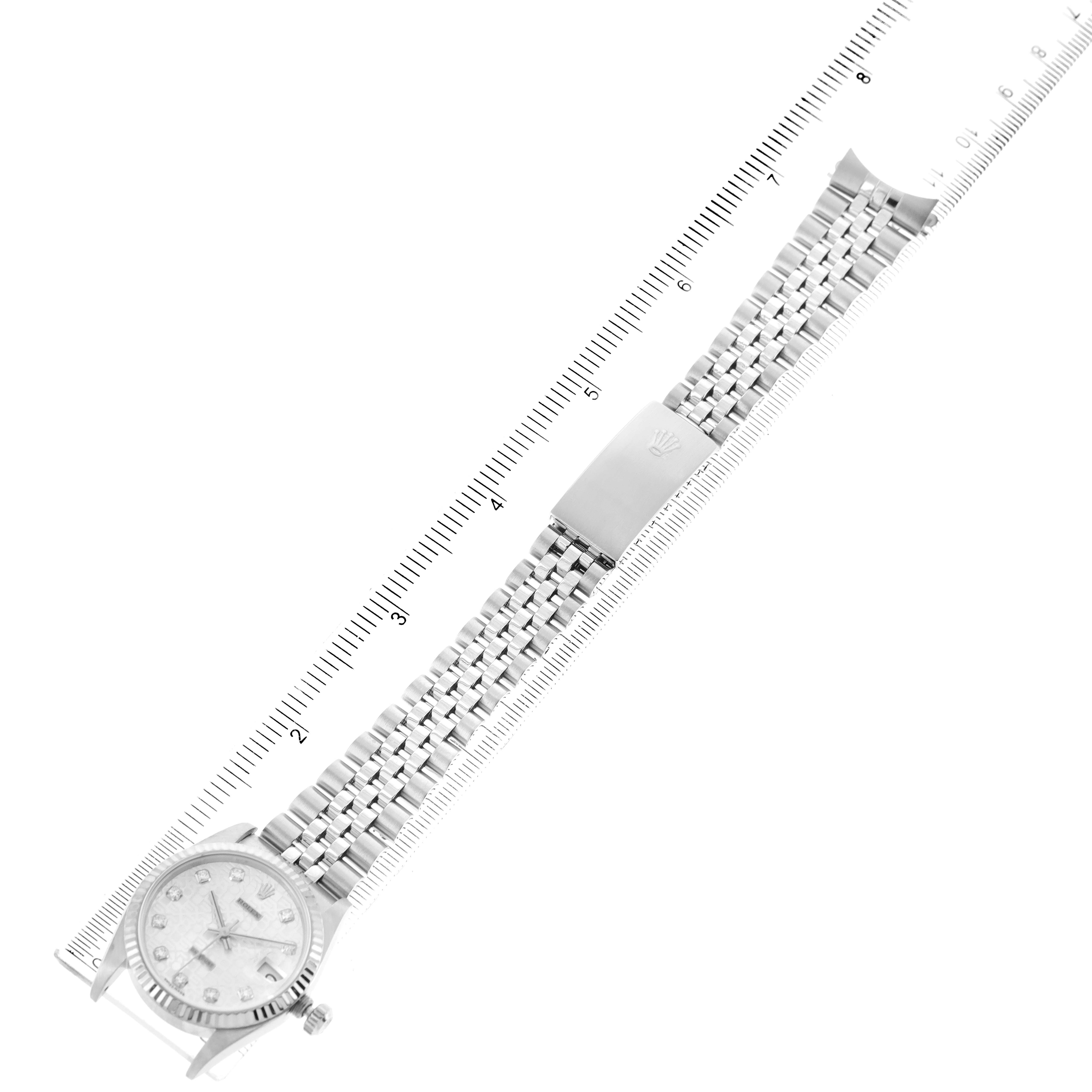 The image shows a Mid-Size Rolex watch from a top-down angle, displaying the dial, bracelet, clasp, and ruler measurements.