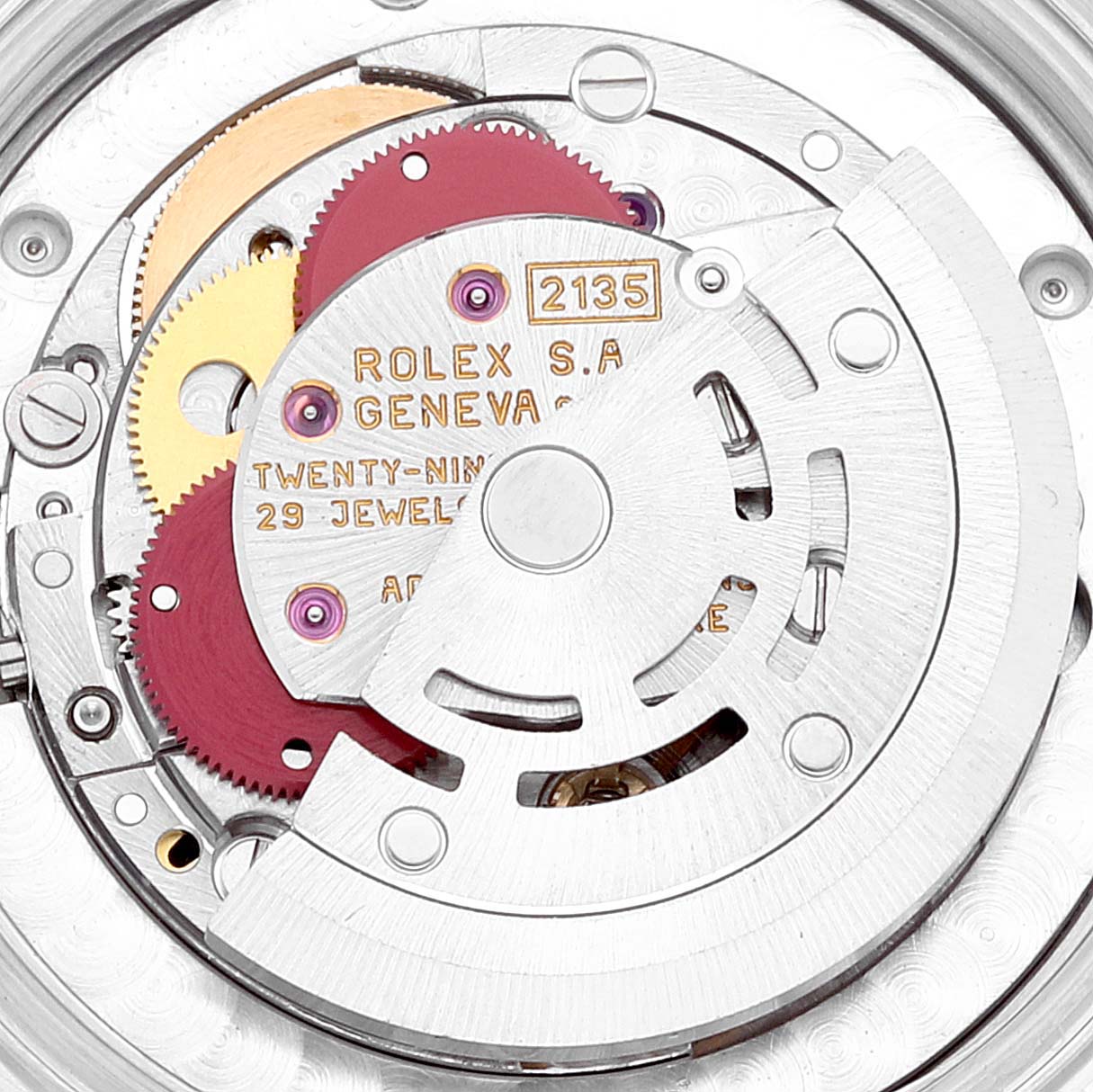 This image shows a close-up view of the movement mechanism of a Mid-Size Rolex watch.