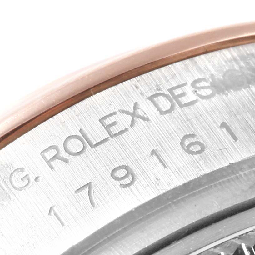 The image shows a close-up of the engraved case back of a Rolex Datejust 179161 Women's Steel and Gold (two tone) Pink Dial 179161 Women's Steel and Gold (two tone) Pink Dial watch, highlighting the model number.