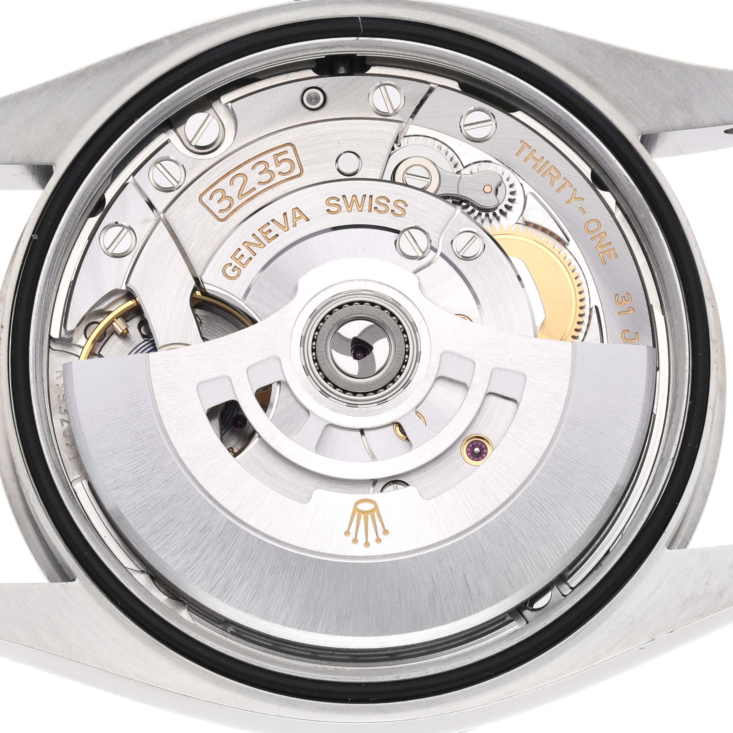 This image shows the case back and visible movement of the Rolex Datejust 126234 Men
s Stainless Steel Green Dial 126234 Men
s Stainless Steel Green Dial model, highlighting its intricate mechanisms.