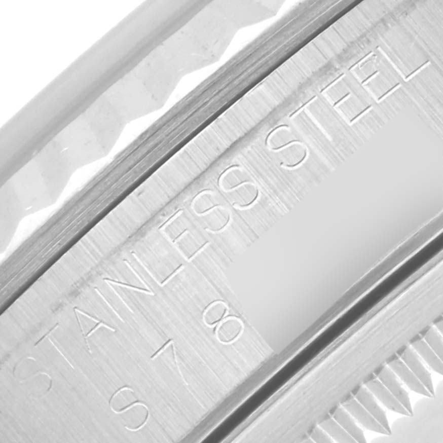 This image shows a close-up of the stainless steel casing of the Rolex Datejust 16234 Men's Stainless Steel White Dial 16234 Men's Stainless Steel White Dial watch.