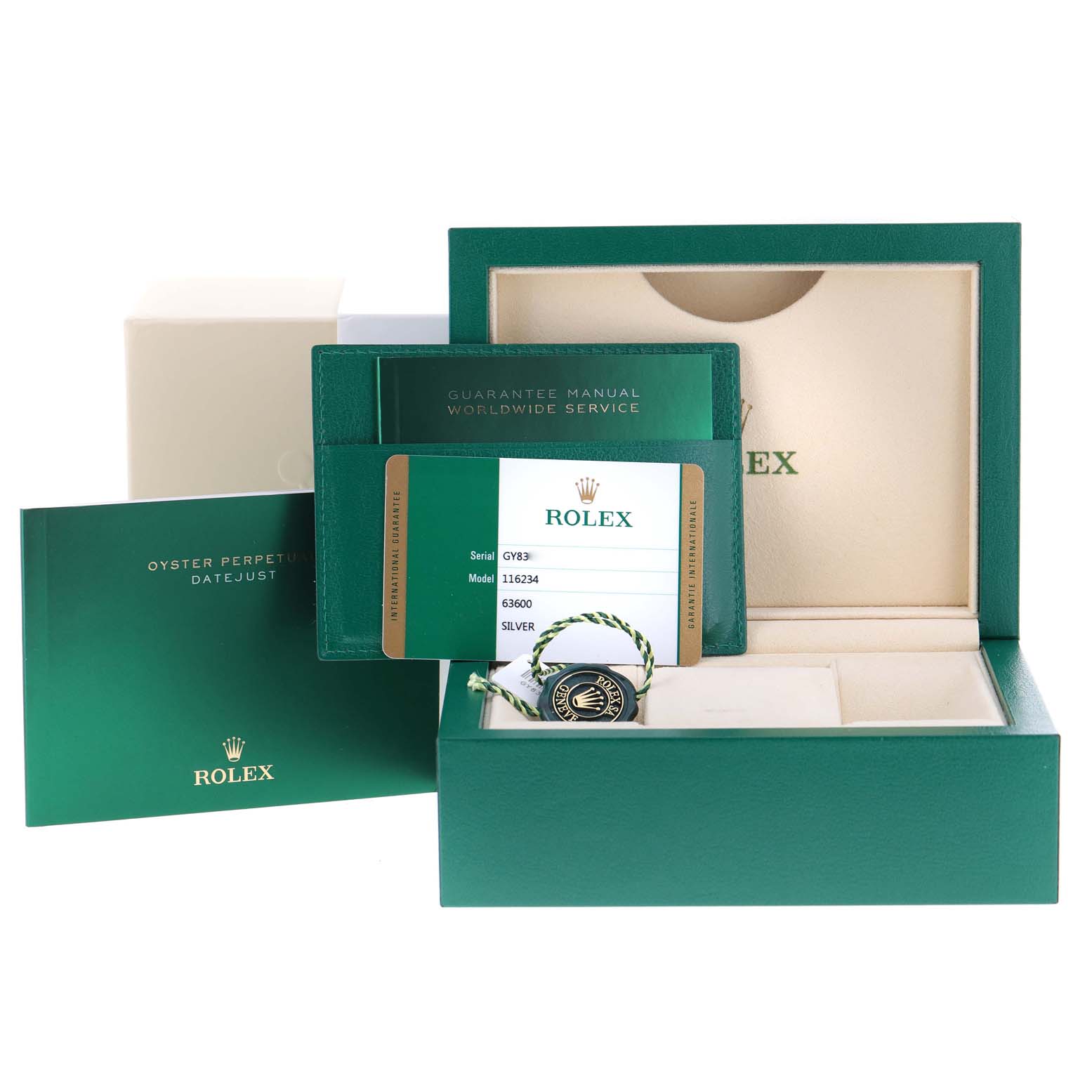 This image shows the packaging, documents, and tags for a Rolex Datejust 116234 Men's Stainless Steel Silver Dial 116234 Men's Stainless Steel Silver Dial watch.