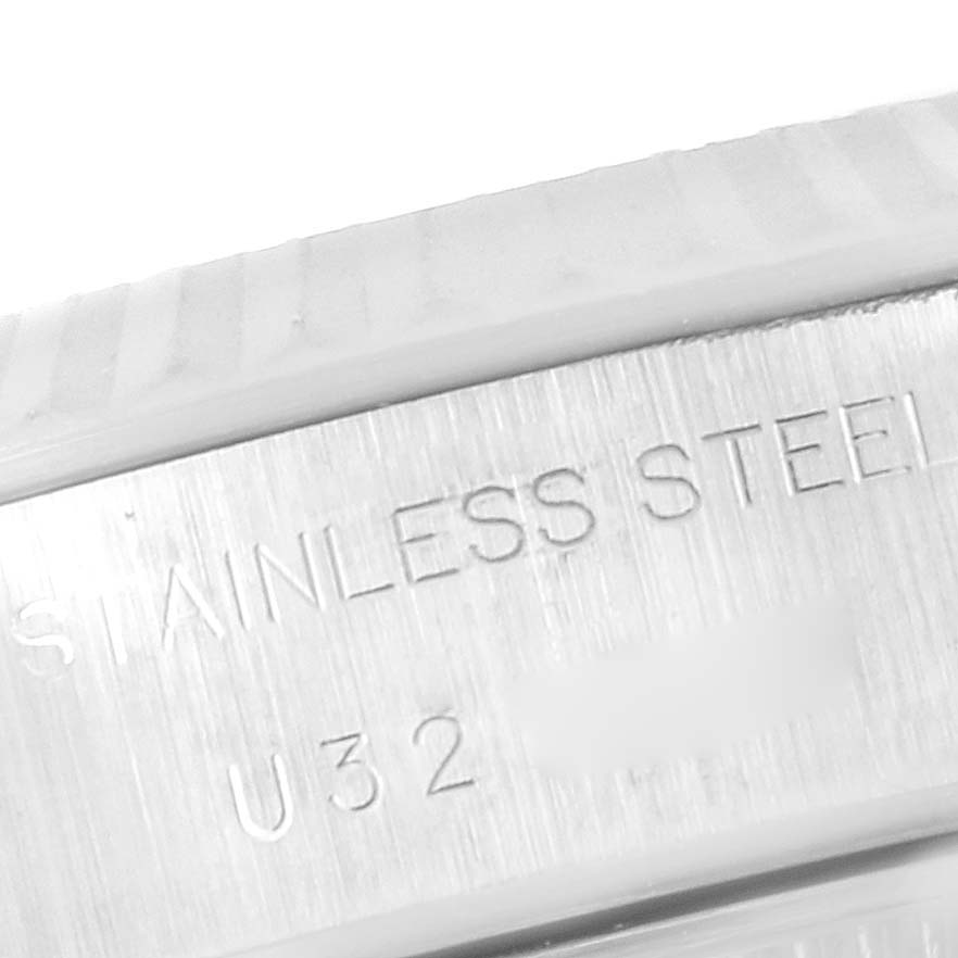 This image shows a close-up of the stainless steel inscription on the side of the Rolex Datejust 69174 Women's Stainless Steel Silver Dial 69174 Women's Stainless Steel Silver Dial watch case.