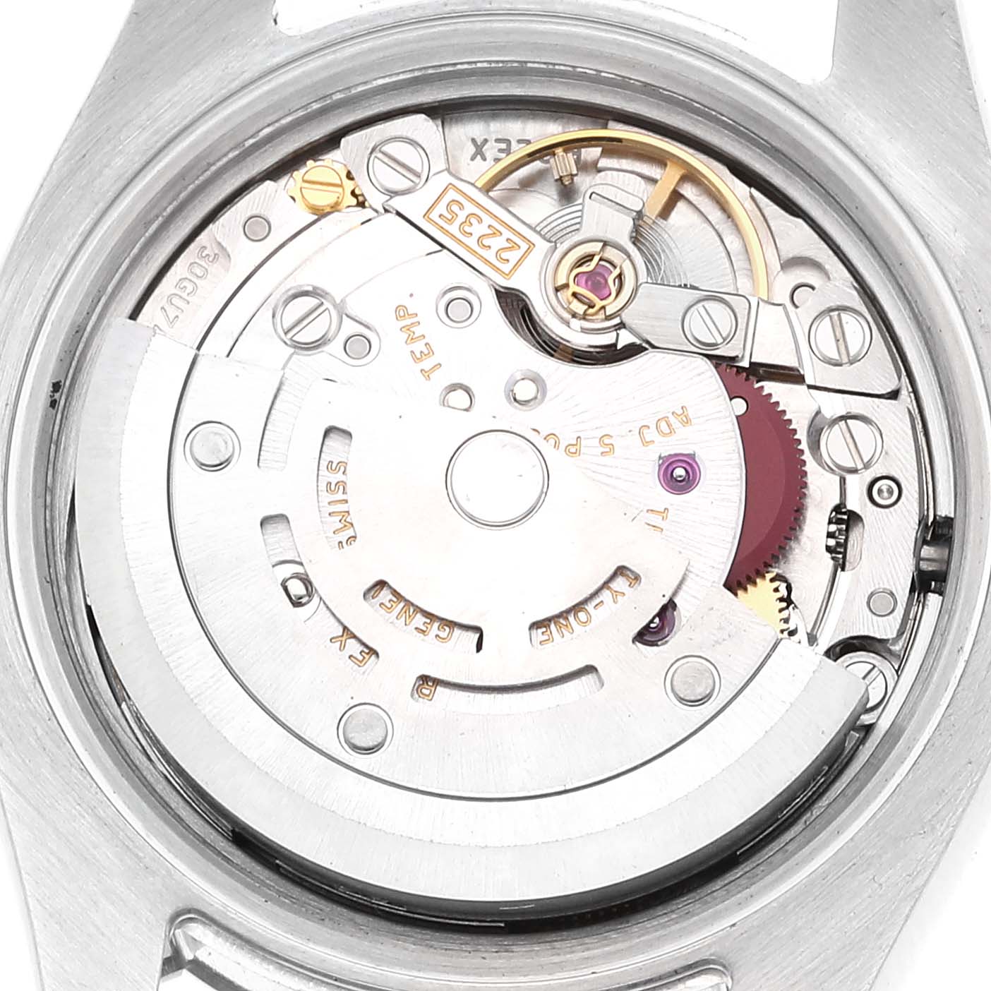 The image shows the movement of a Rolex Datejust 179174 Women's Stainless Steel White Dial 179174 Women's Stainless Steel White Dial watch from the back, focusing on its internal mechanical components.