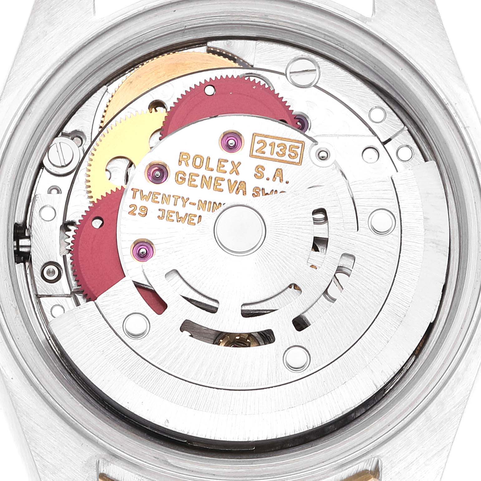 This image shows a close-up view of the movement mechanism inside a Rolex Datejust 69173 Women's Steel and Gold (two tone) Champagne Dial 69173 Women's Steel and Gold (two tone) Champagne Dial watch, featuring the caliber 2135.