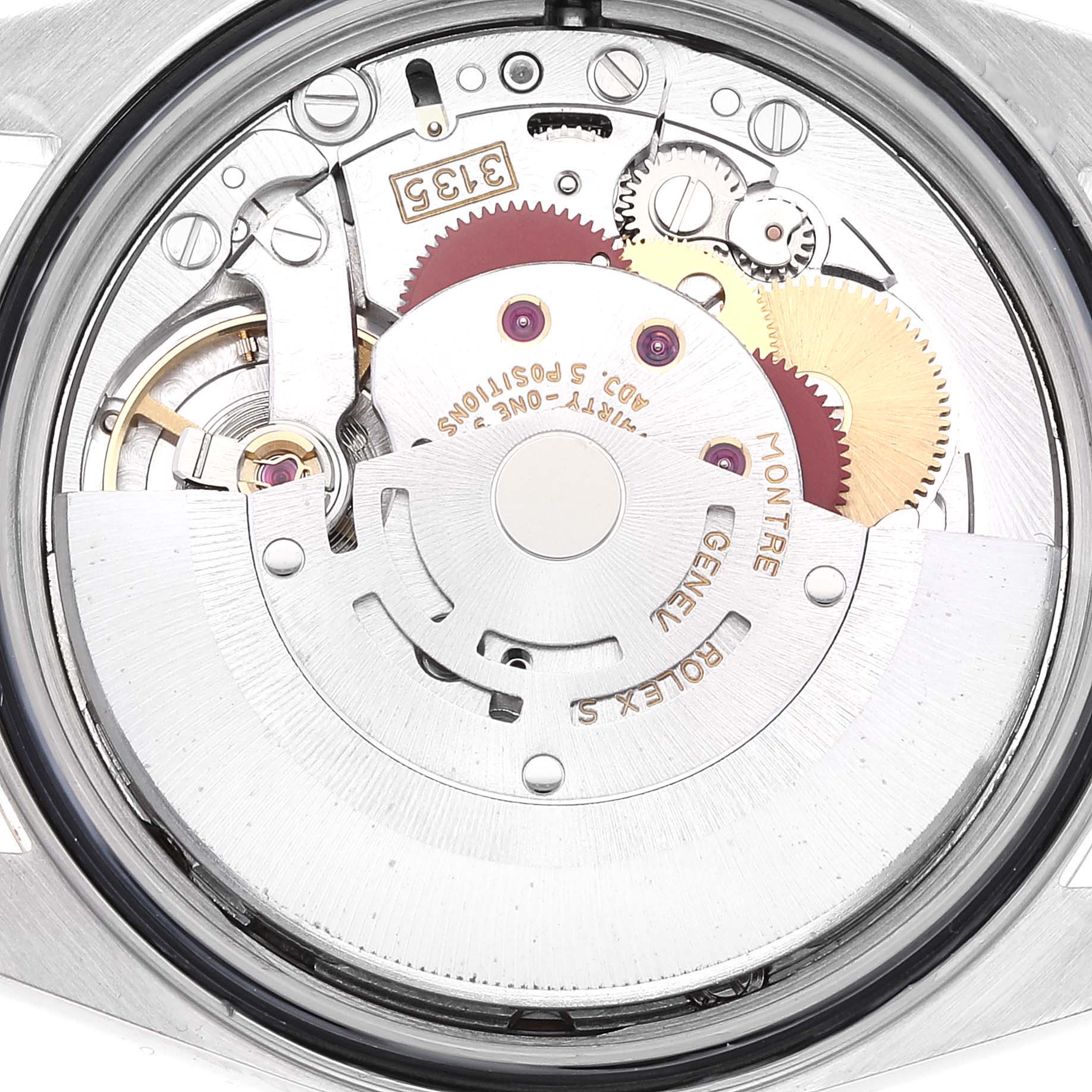 This is a close-up shot of the movement mechanism of a Rolex Datejust 16233 Men's Steel and Gold (two tone) Champagne Dial 16233 Men's Steel and Gold (two tone) Champagne Dial watch.