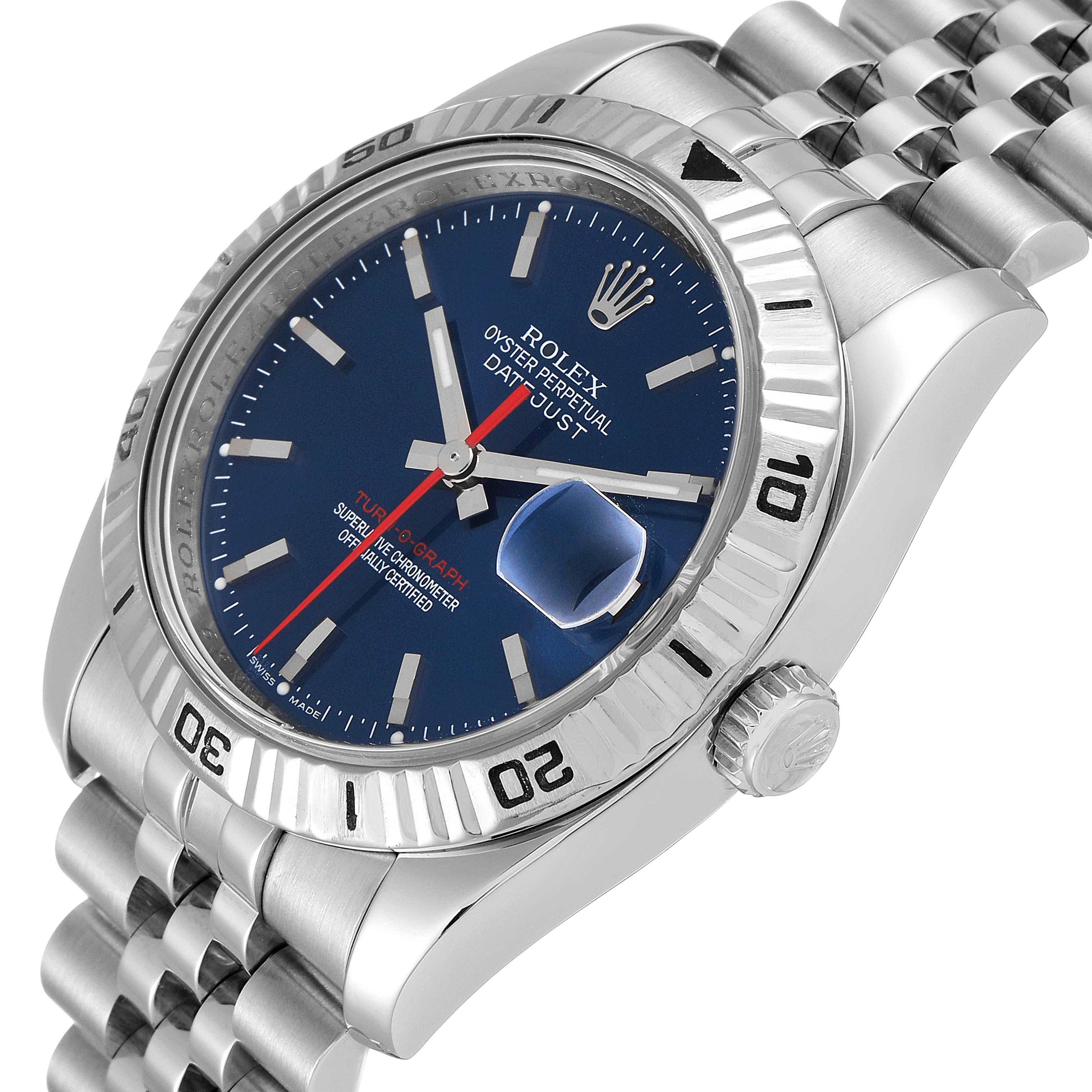 The image shows a Rolex Turn-o-Graph 116264 Men
s Stainless Steel Blue Dial 116264 Men
s Stainless Steel Blue Dial watch at an angled view, highlighting its blue dial, bezel, and part of the stainless steel bracelet.