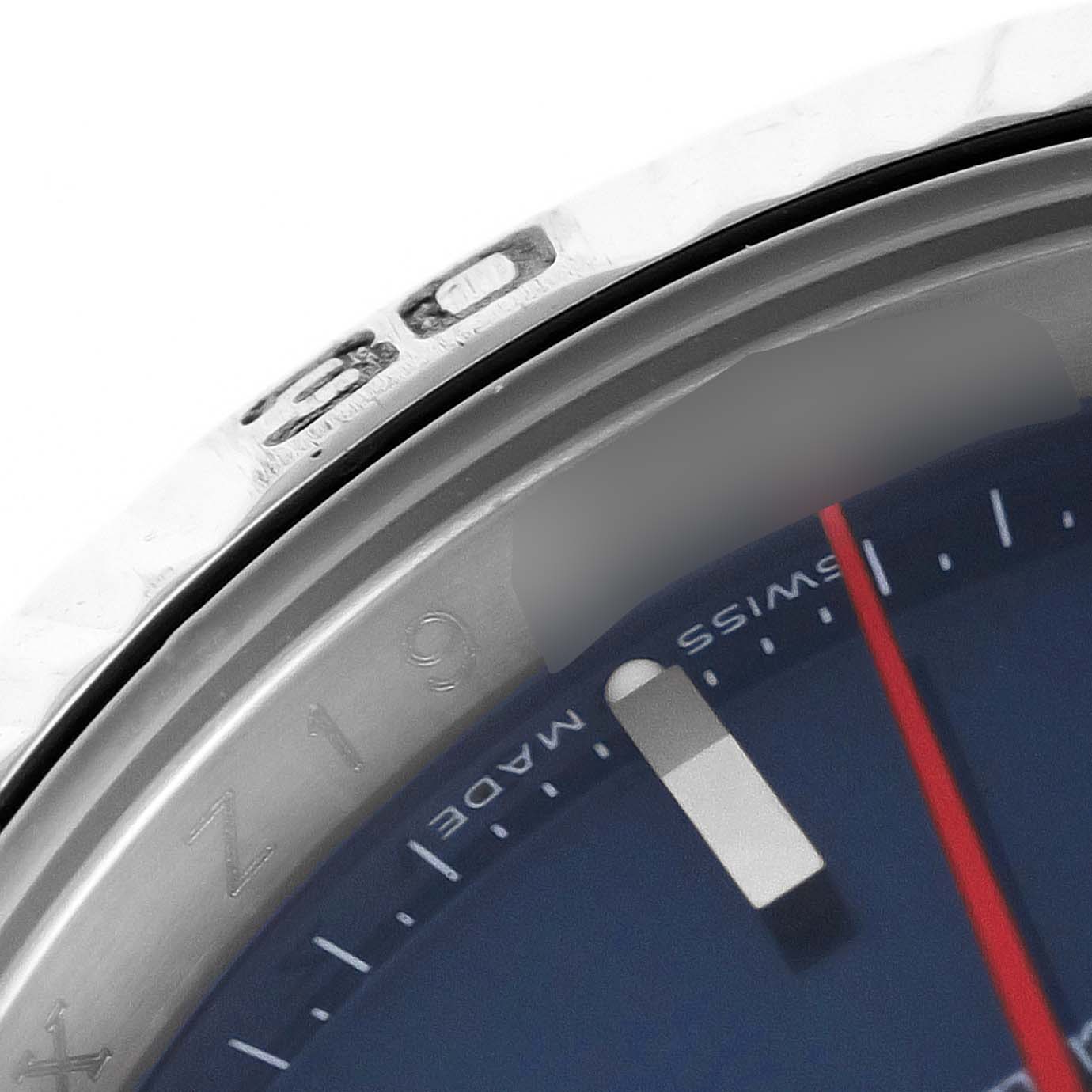 This image shows a close-up of the bezel and dial of a Rolex Turn-o-Graph 116264 Men
s Stainless Steel Blue Dial 116264 Men
s Stainless Steel Blue Dial, focusing on the "30" marker and part of the watch face.