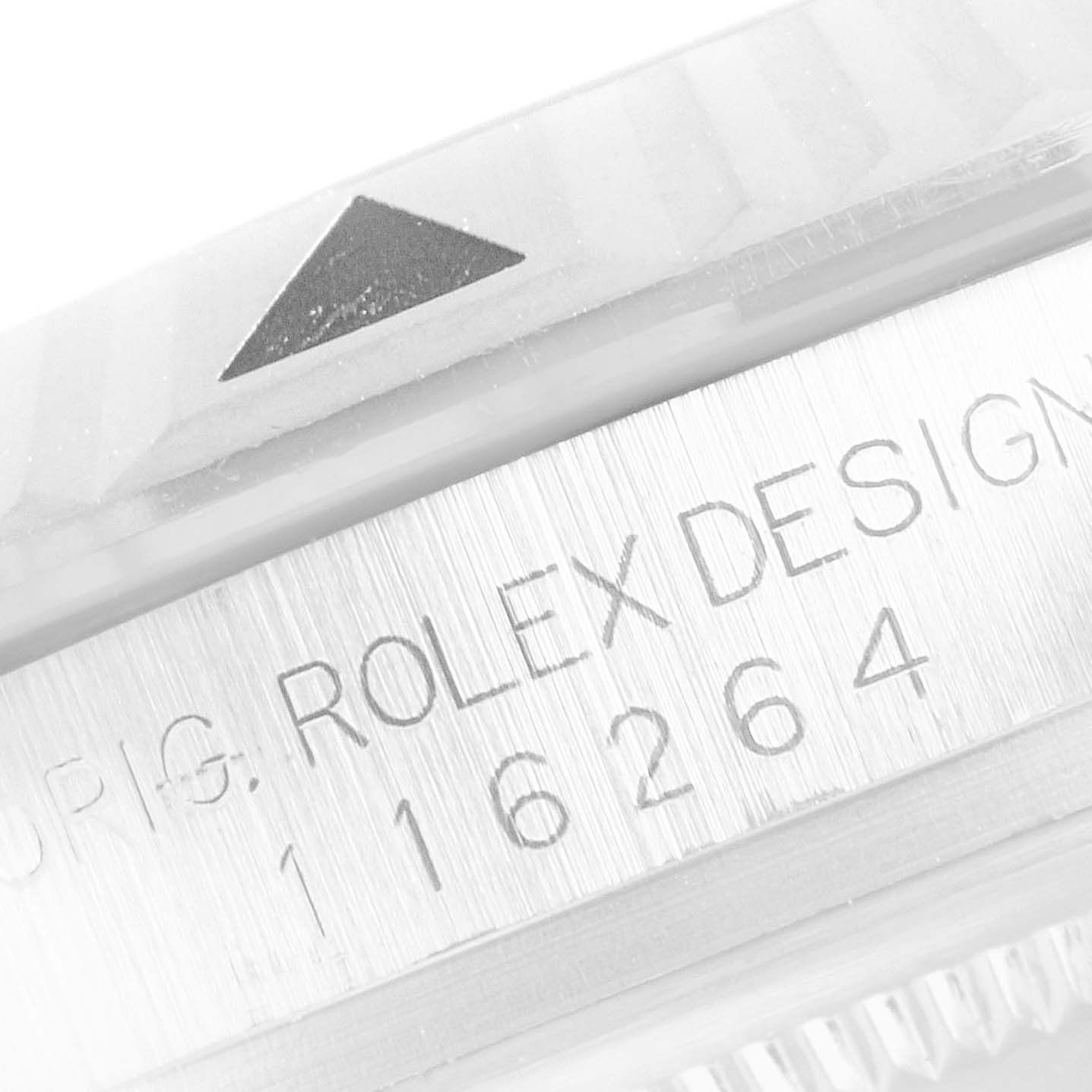 This image shows a close-up of the bezel and case side with engraved details of a Rolex Turn-o-Graph 116264 Men
s Stainless Steel Blue Dial 116264 Men
s Stainless Steel Blue Dial watch.