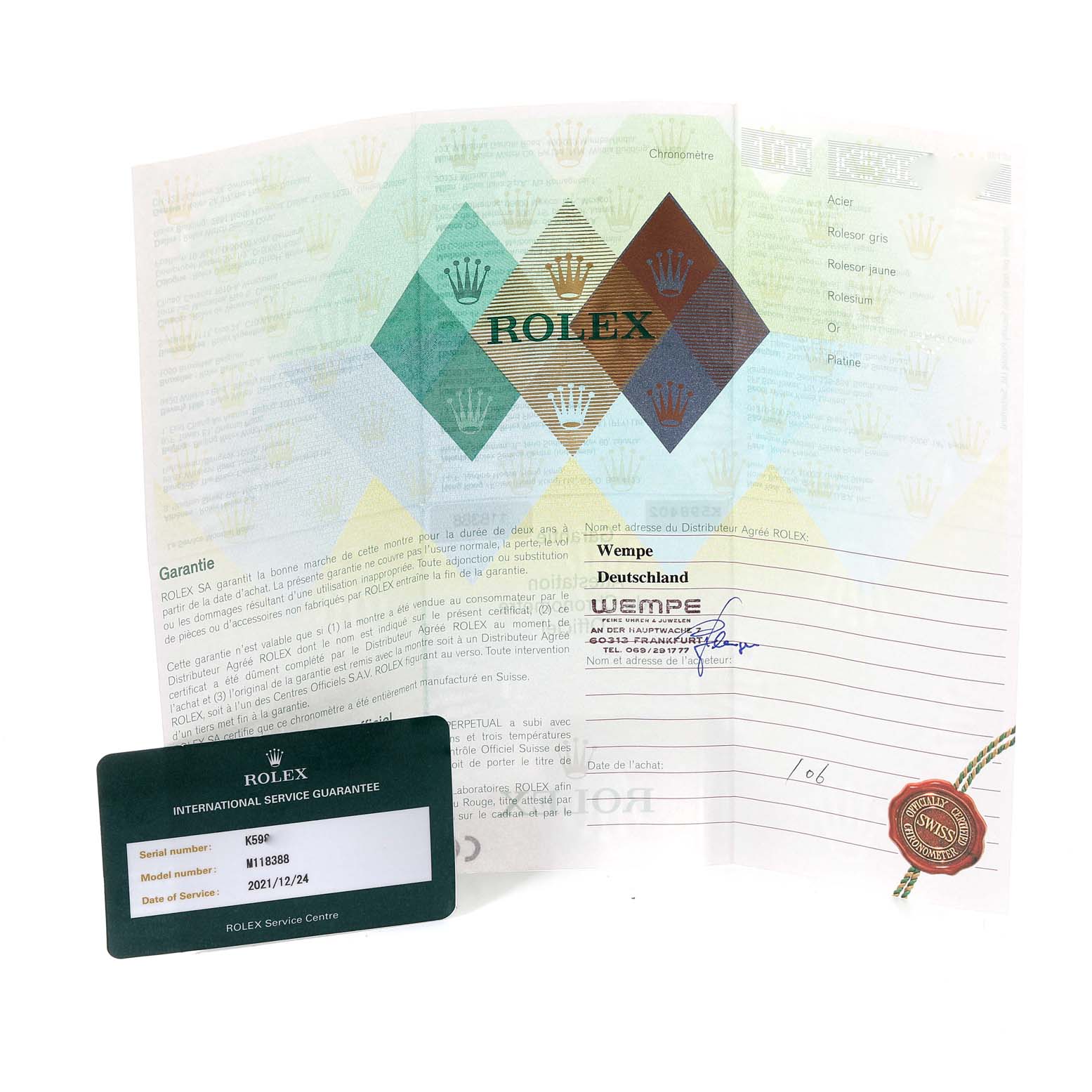 This image shows the guarantee papers and the international service guarantee card for the Rolex President 118388 Men's Yellow Gold Champagne Dial 118388 Men's Yellow Gold Champagne Dial model watch.