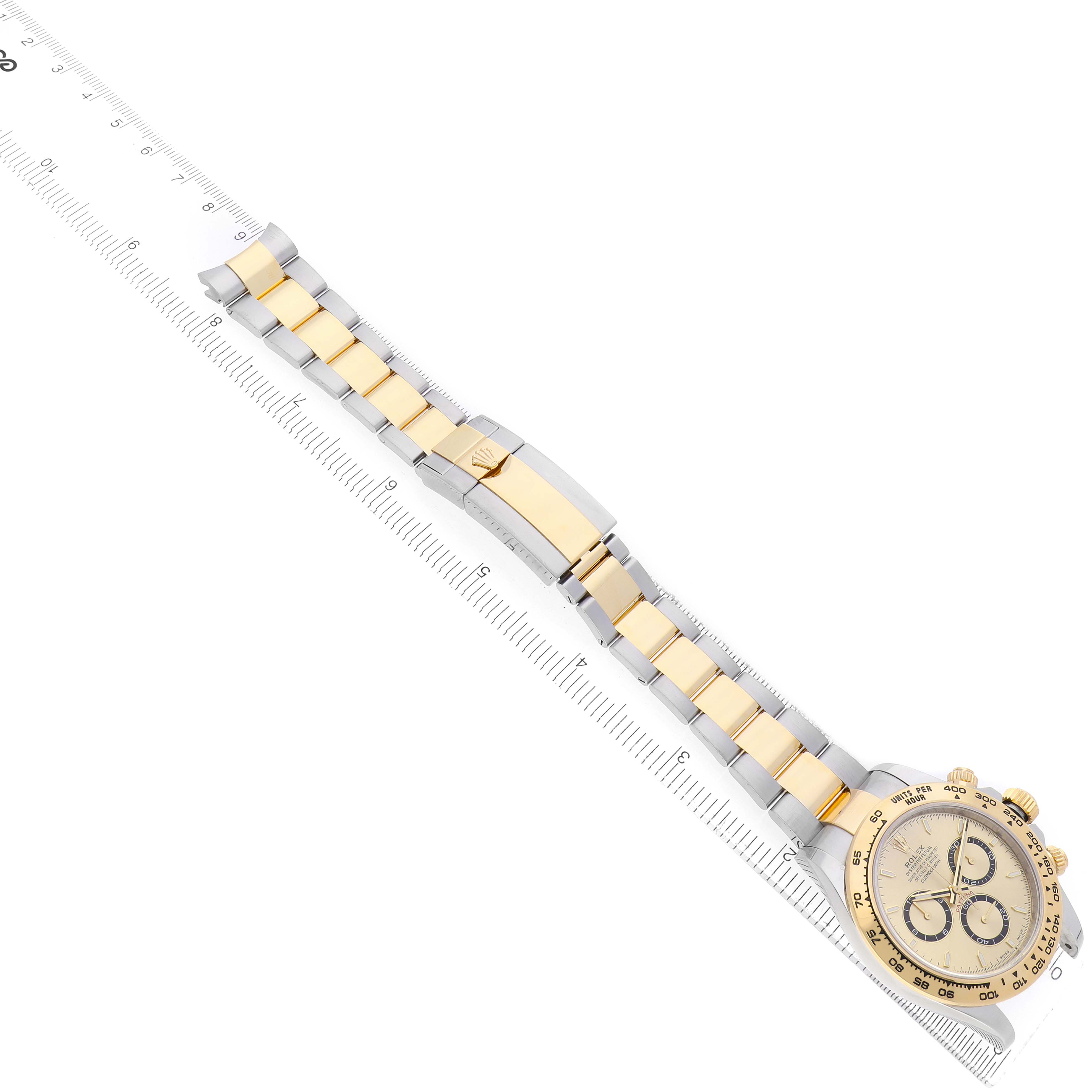 The Rolex Daytona 126503 Men's Steel and Gold (two tone) Champagne Dial watch is shown from a top view, featuring the dial, bezel, bracelet, and clasp.