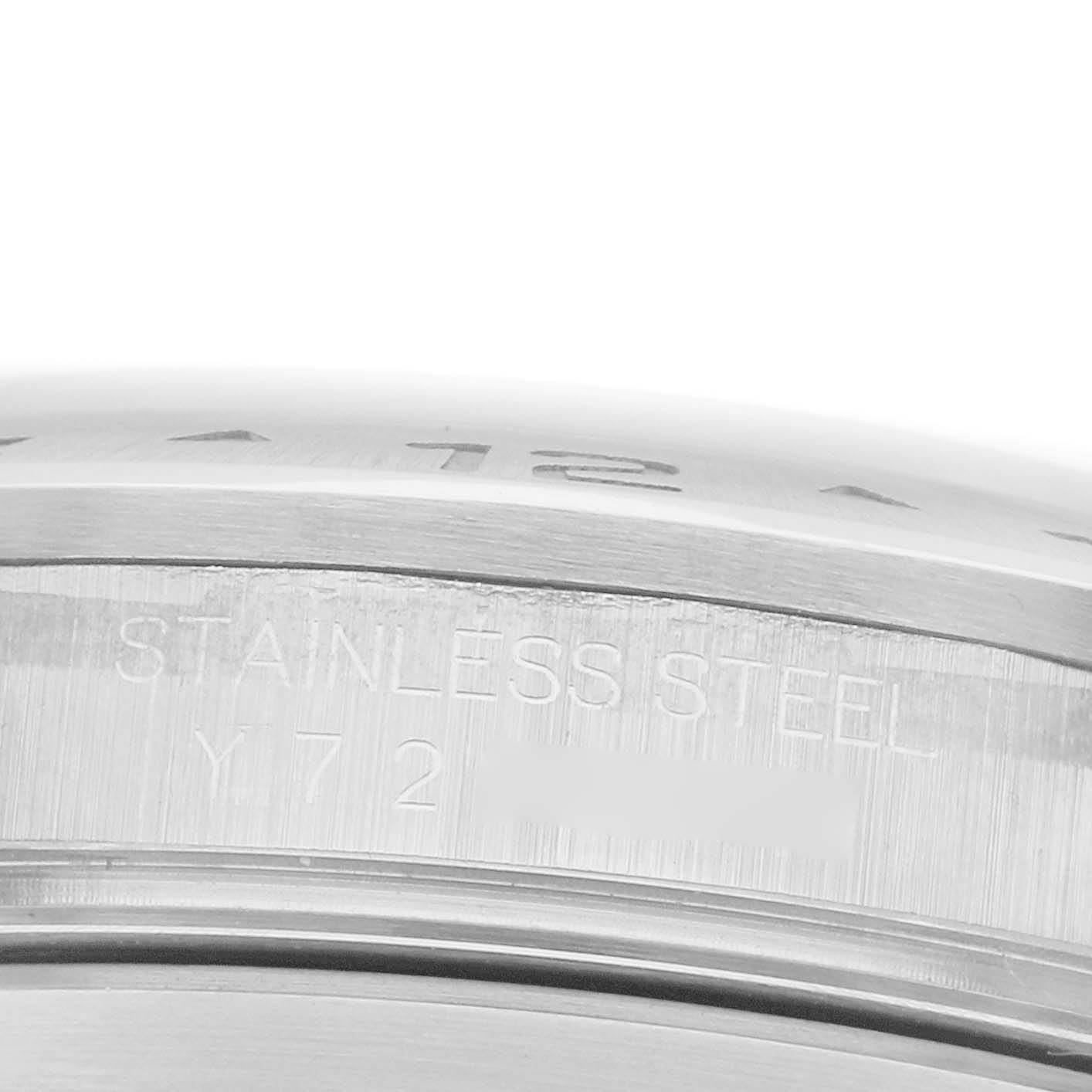 The image shows a close-up of the side of the Rolex Explorer 16570 Men's Stainless Steel Black Dial watch, highlighting its stainless steel construction.