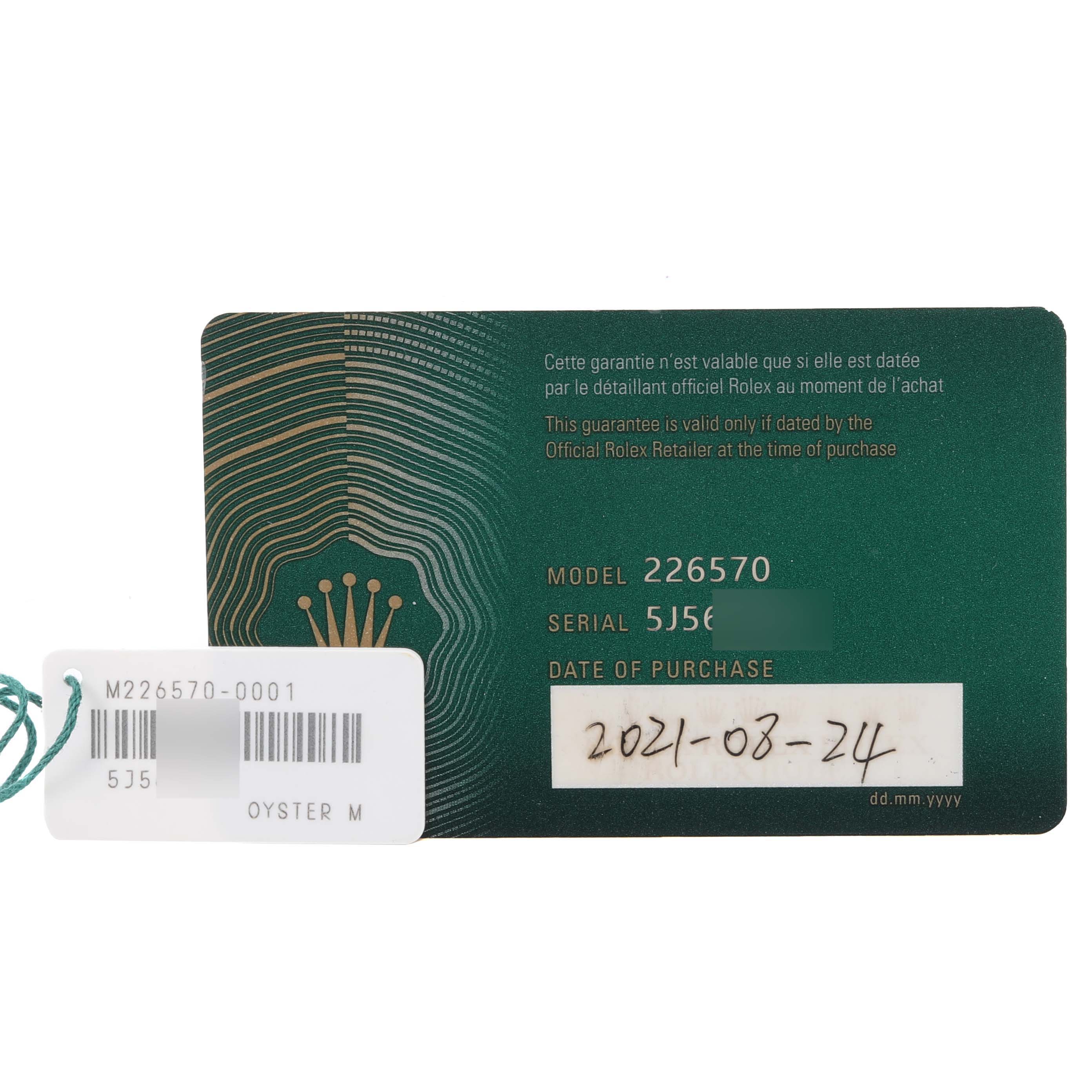 The image shows the warranty card and hang tag for the Rolex Explorer 226570 Men's Stainless Steel White Dial 226570 Men's Stainless Steel White Dial model 226570.