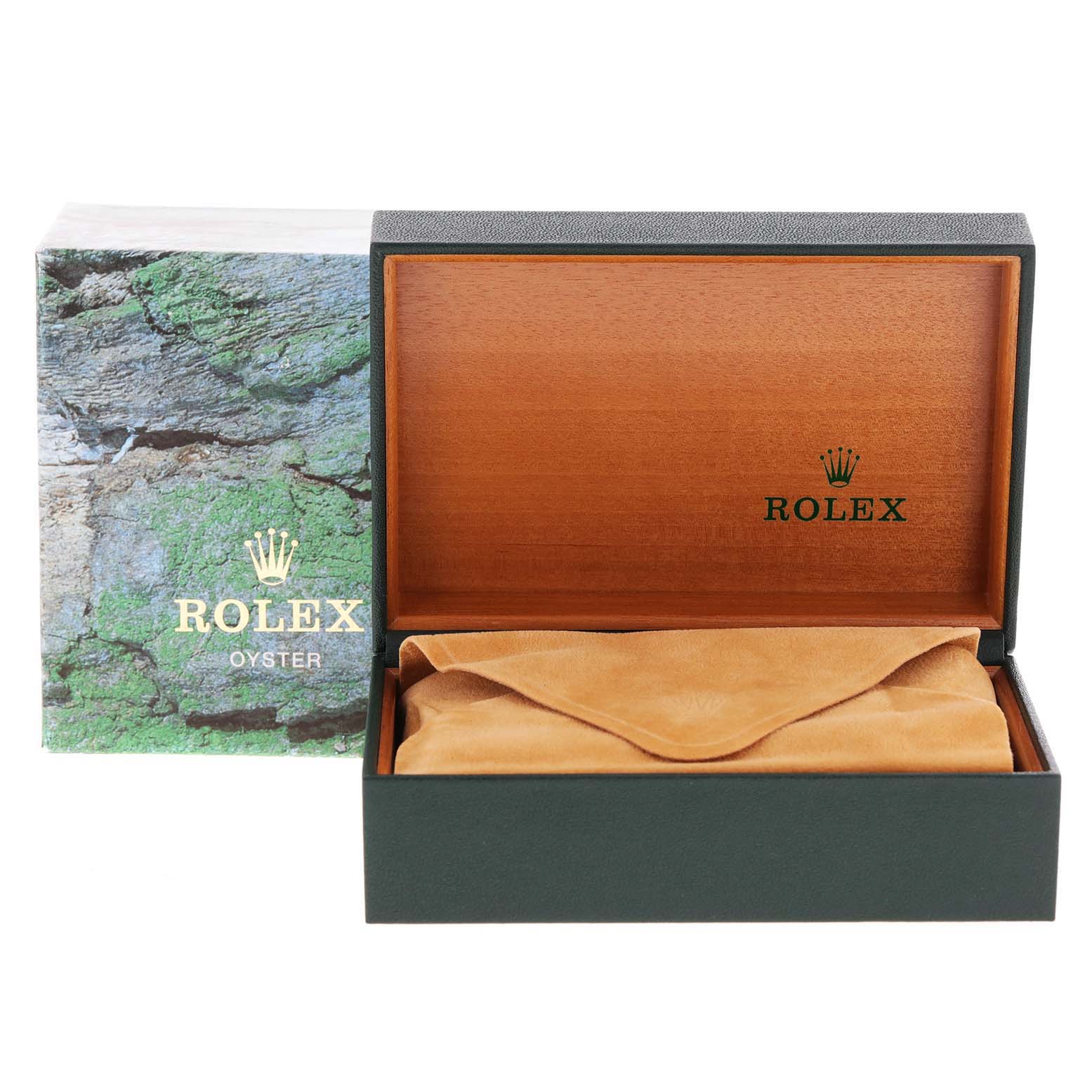 The image shows the packaging box and velvet pouch of a Rolex GMT-Master 16710 Men
s Stainless Steel Black Dial 16710 Men
s Stainless Steel Black Dial watch.
