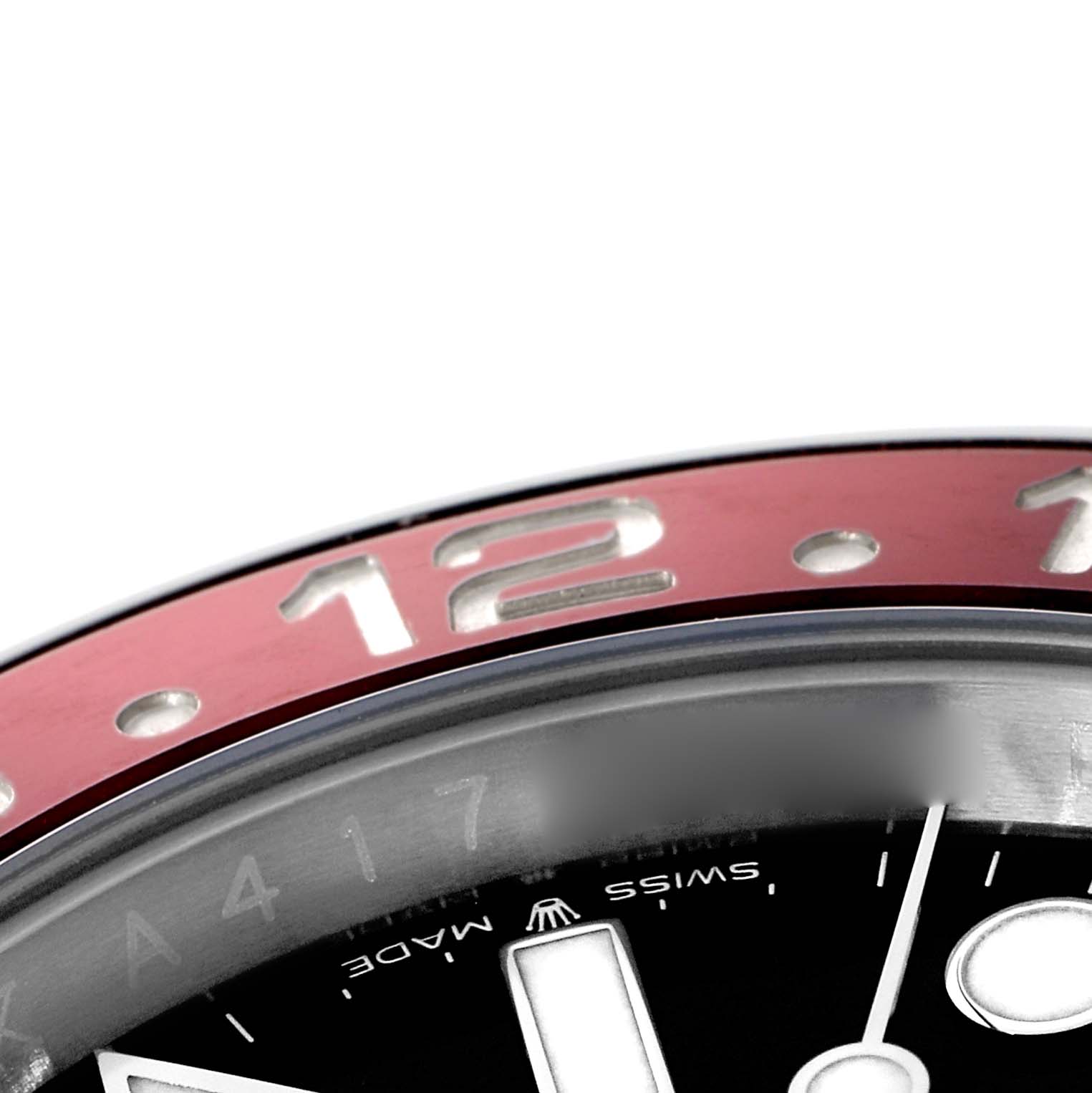 The image shows a close-up of the red and silver bezel, part of the dial, and hour markers of a Rolex GMT-Master 126710 Men's Stainless Steel Black Dial watch.