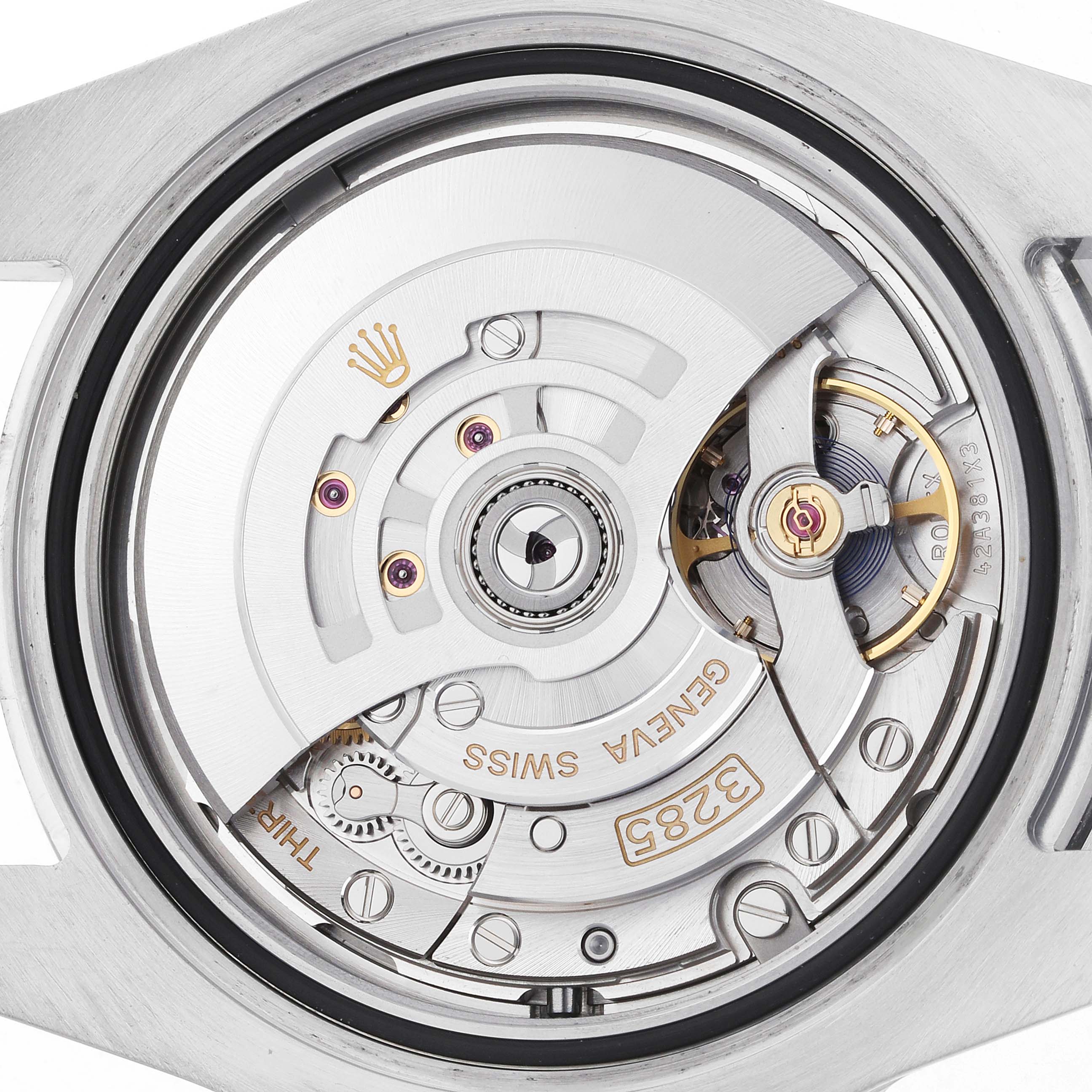 This image shows the movement of a Rolex GMT-Master 126710 Men's Stainless Steel Black Dial, viewed from the back, highlighting the intricate details of the mechanism.