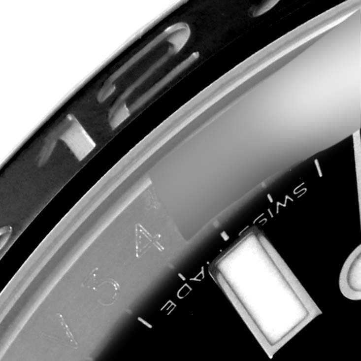 The image shows a close-up of the dial and bezel of a Rolex GMT-Master 116710 Men
s Stainless Steel Black Dial 116710 Men
s Stainless Steel Black Dial watch.