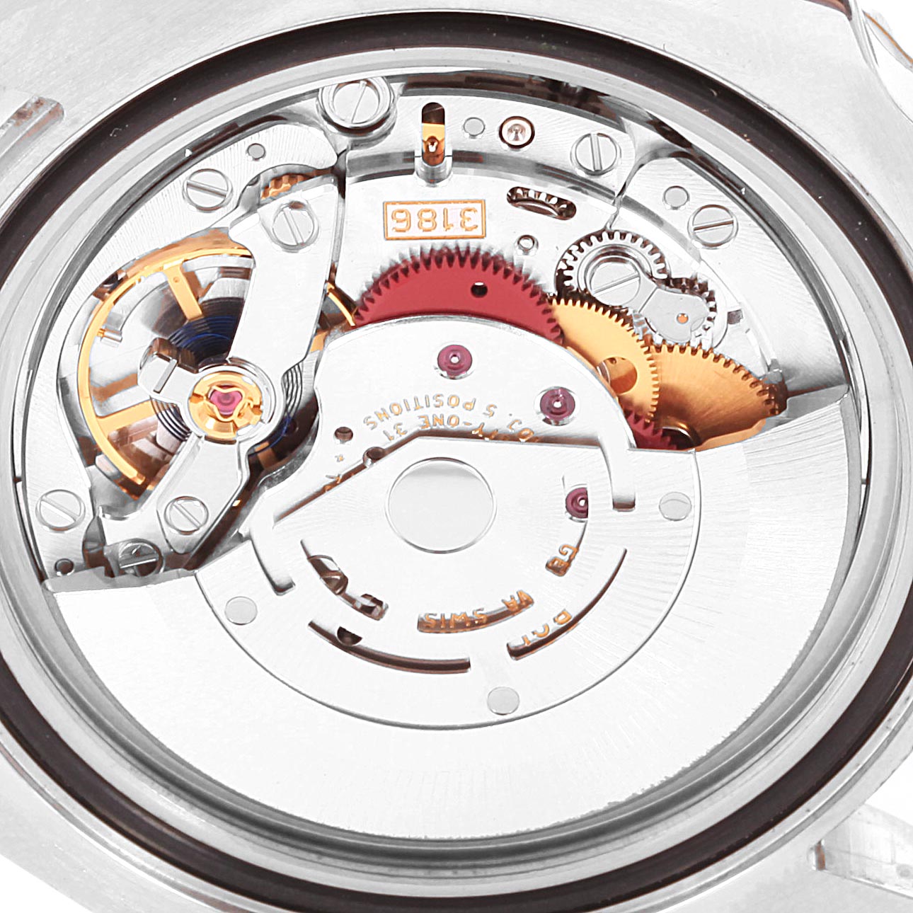 This image shows the internal mechanism of a Rolex GMT-Master 116713 Men's Steel and Gold (two tone) Black Dial 116713 Men's Steel and Gold (two tone) Black Dial watch, focusing on the movement and gearing components.