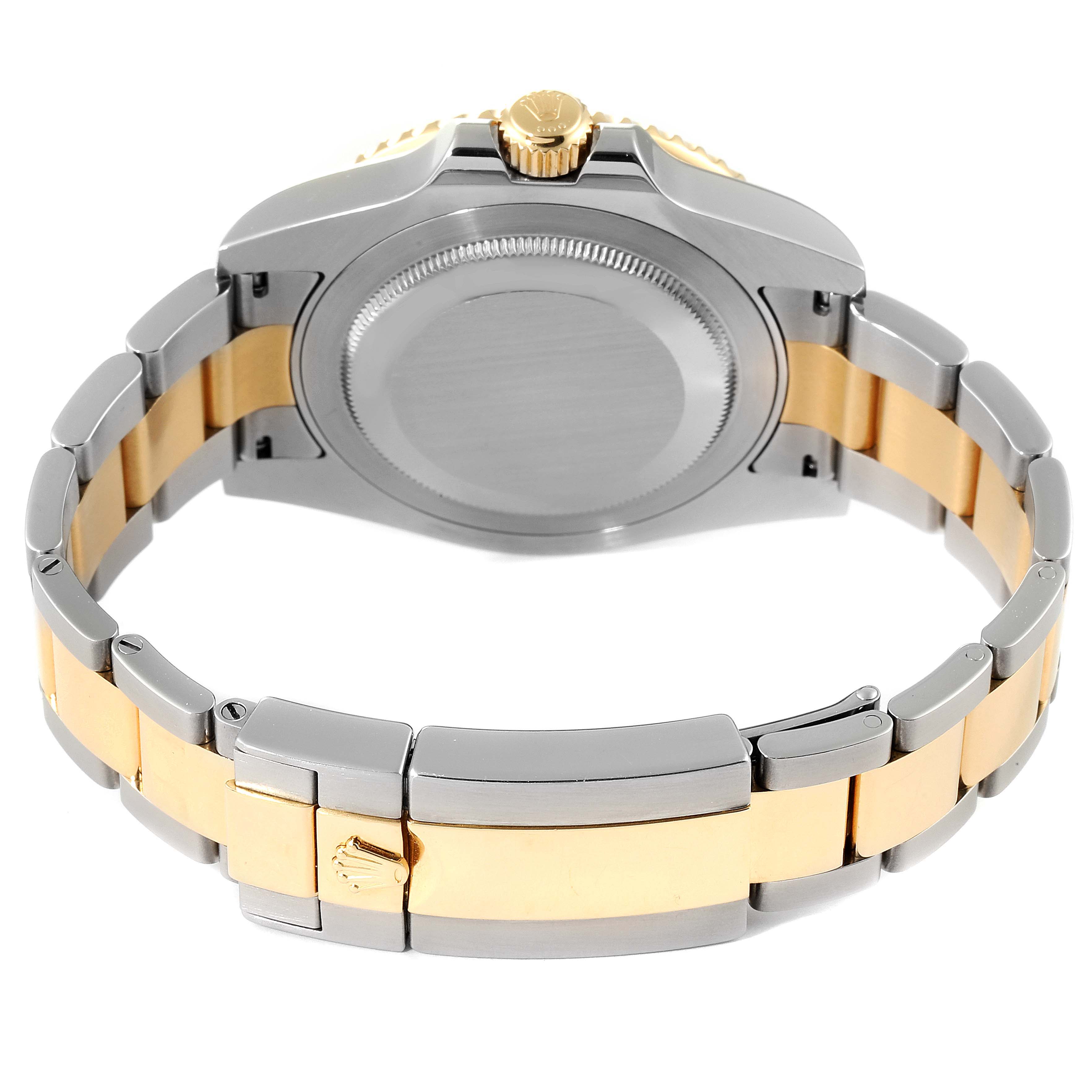 This image shows the back view of a Rolex GMT-Master 116713 Men's Steel and Gold (two tone) Black Dial 116713 Men's Steel and Gold (two tone) Black Dial watch, focusing on the case and two-tone bracelet.