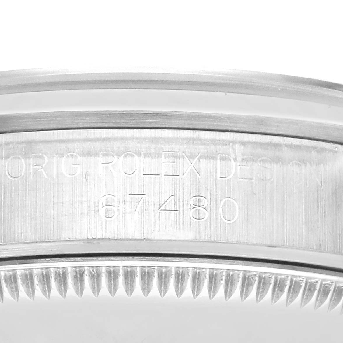 This image shows a close-up of the case side of a Mid-Size Rolex watch, showcasing the engraved model number.