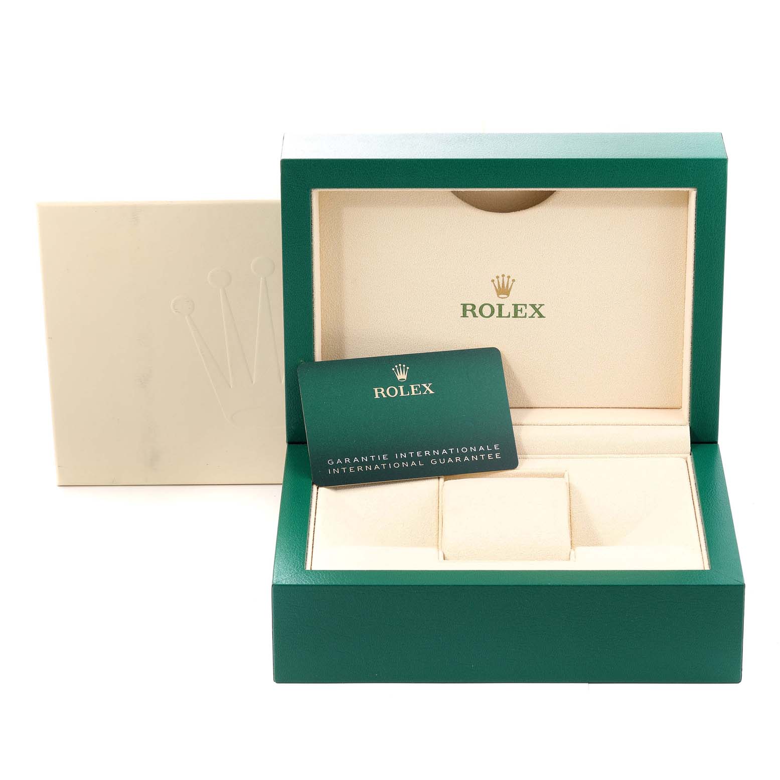 The image shows the open box and international guarantee card for a Mid-Size Rolex watch.