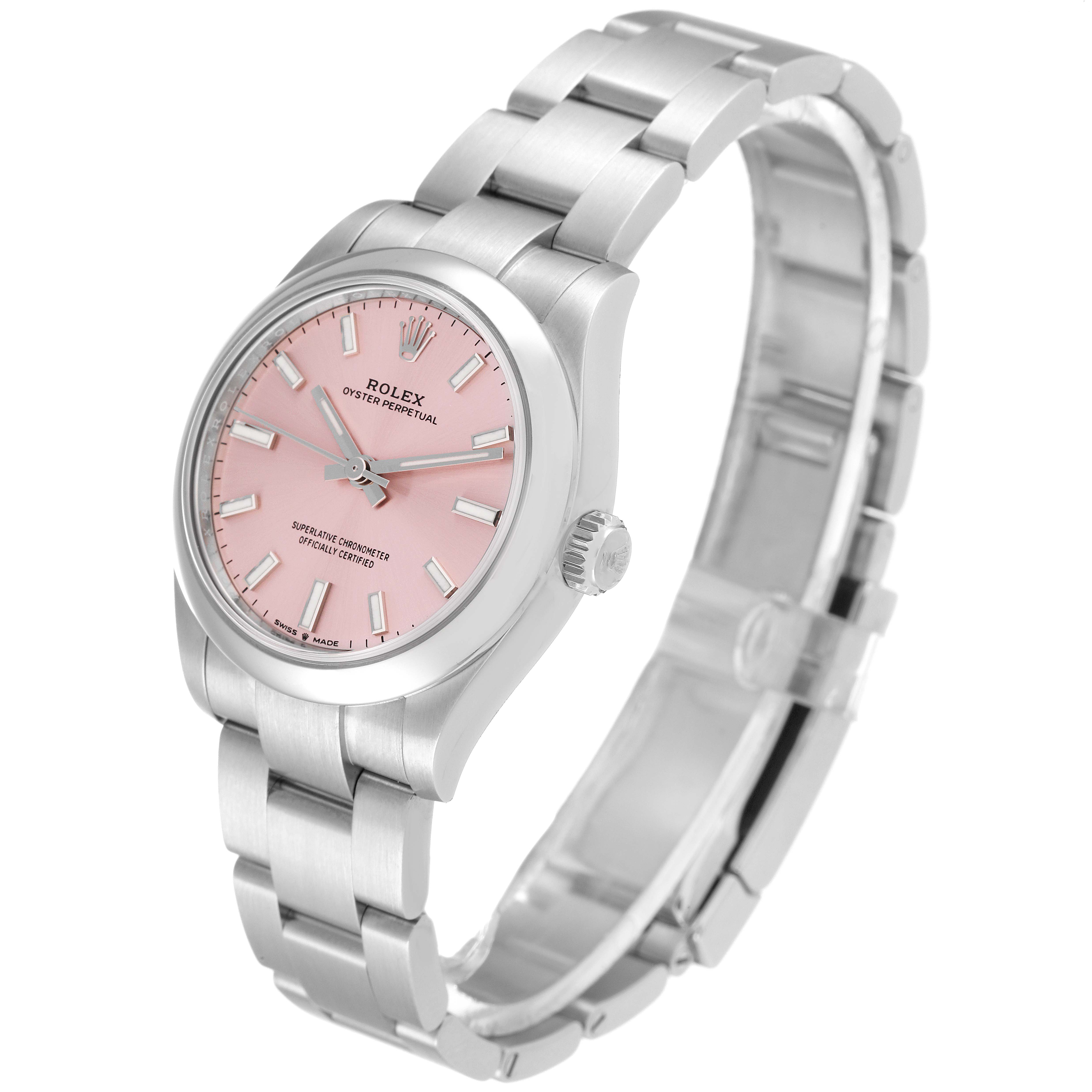The watch is a Rolex Mid-Size 277200 Women's Stainless Steel Pink Dial 277200 Women's Stainless Steel Pink Dial model, shown from a three-quarter angle, highlighting the face, bezel, crown, bracelet, and clasp.