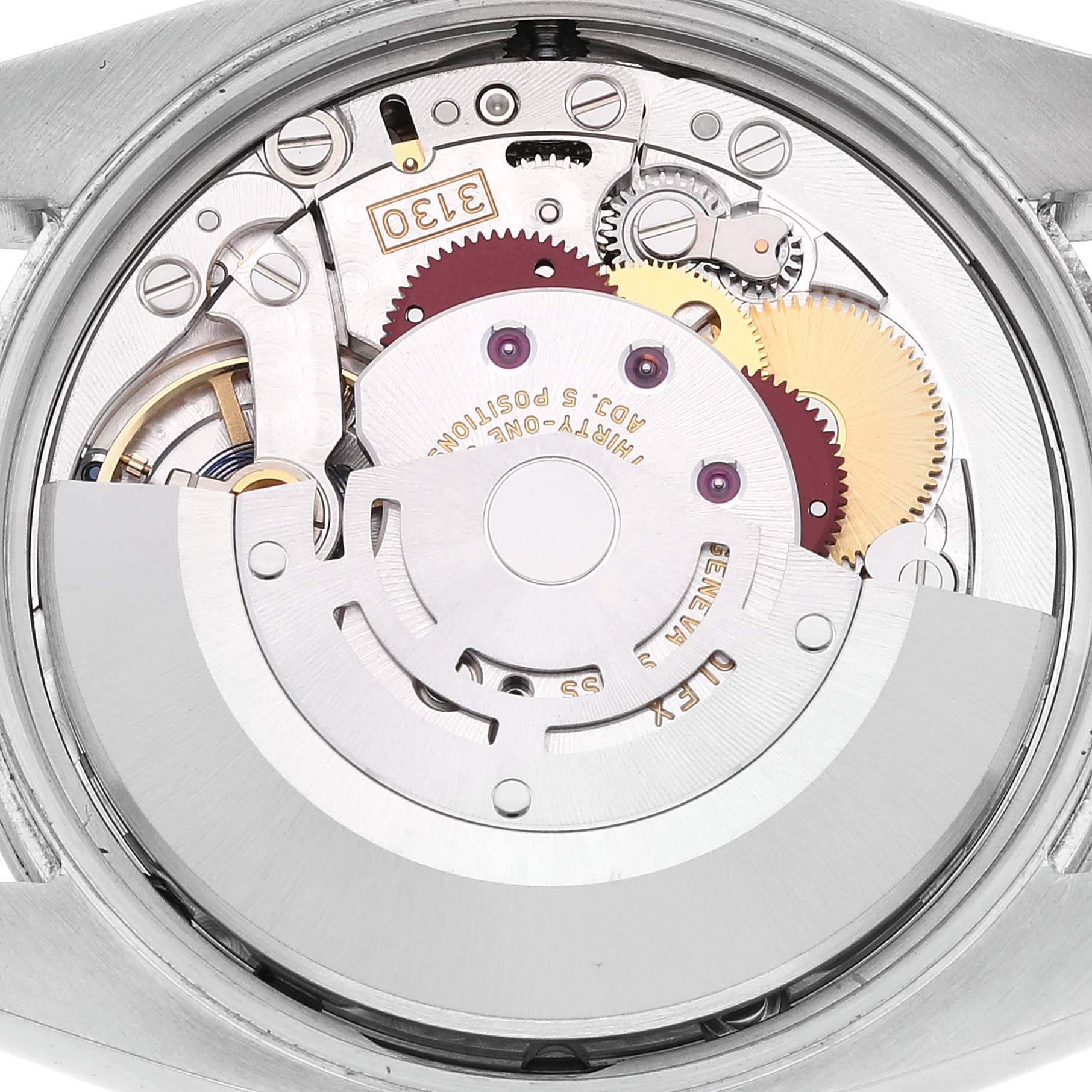 This image shows the internal mechanism of a Rolex Oyster Perpetual 114200 Men's Stainless Steel Green Dial 114200 Men's Stainless Steel Green Dial, including gears and rotors, viewed from the back.