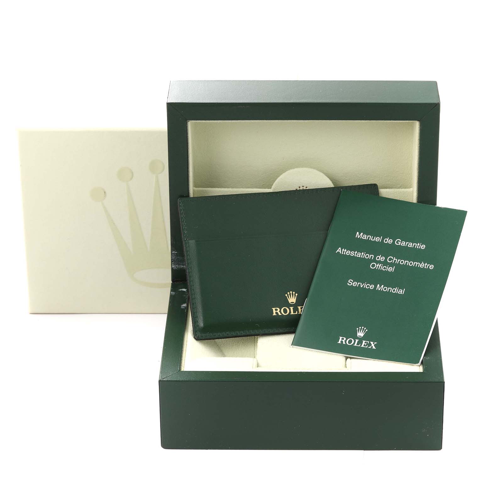 This image shows the packaging and documentation of a Rolex Oyster Perpetual 116000 Men
s Stainless Steel Black Dial 116000 Men
s Stainless Steel Black Dial, including a green box, warranty manual, and official booklet.