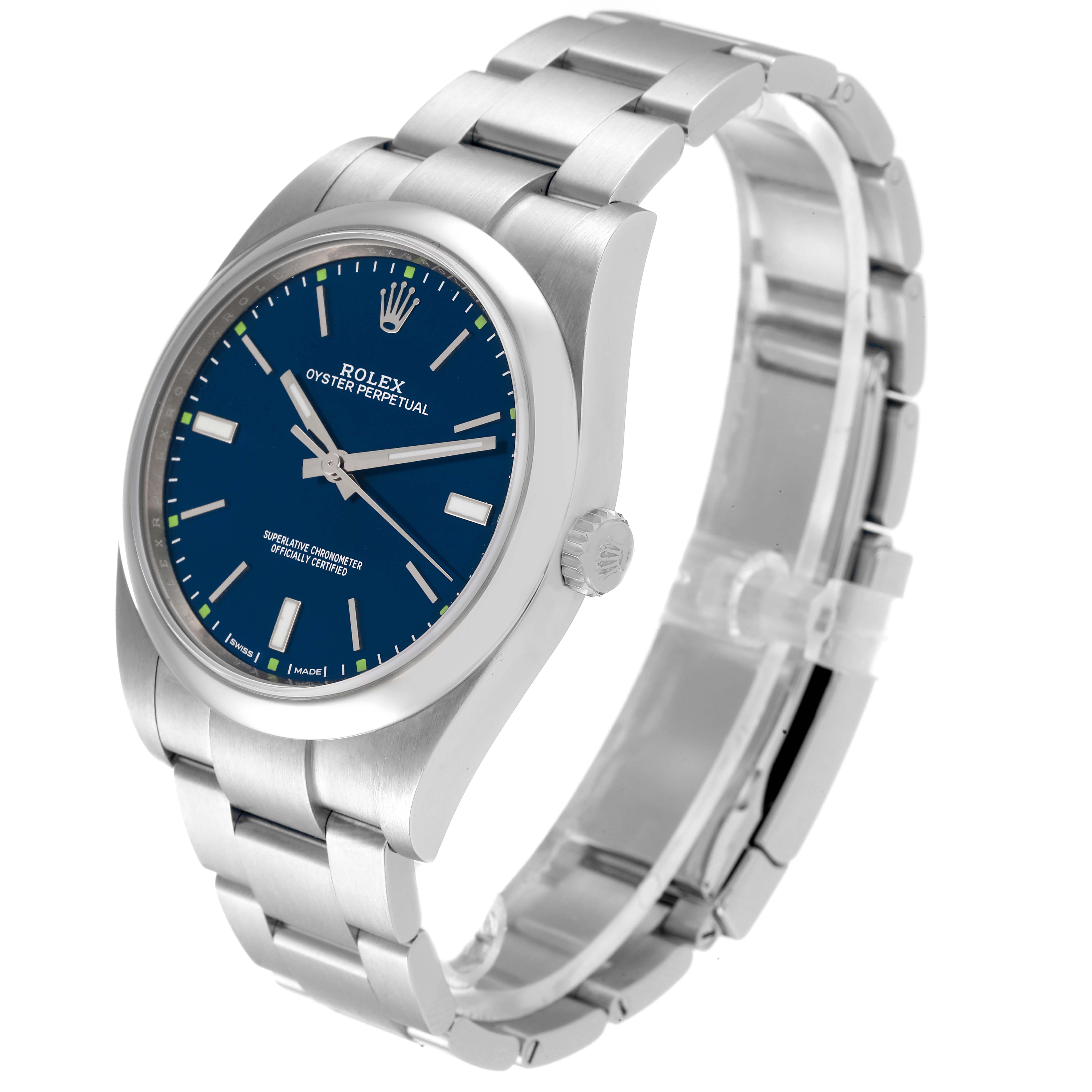 The image shows a Rolex Oyster Perpetual 114300 Men's Stainless Steel Blue Dial 114300 Men's Stainless Steel Blue Dial watch at a three-quarter angle, revealing its blue dial, case, and bracelet.