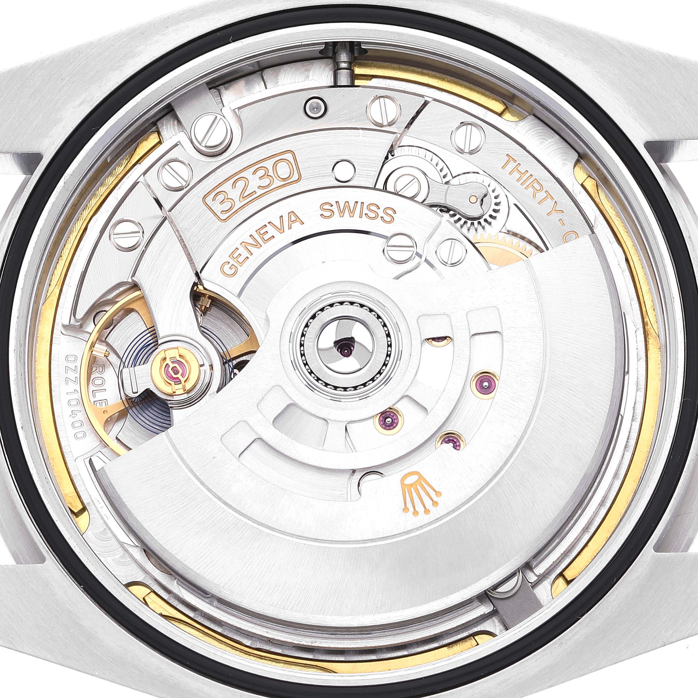 This image shows the movement mechanism and intricate parts of the Rolex Oyster Perpetual 124300 Men
s Stainless Steel Green Dial 124300 Men
s Stainless Steel Green Dial watch from a back angle.