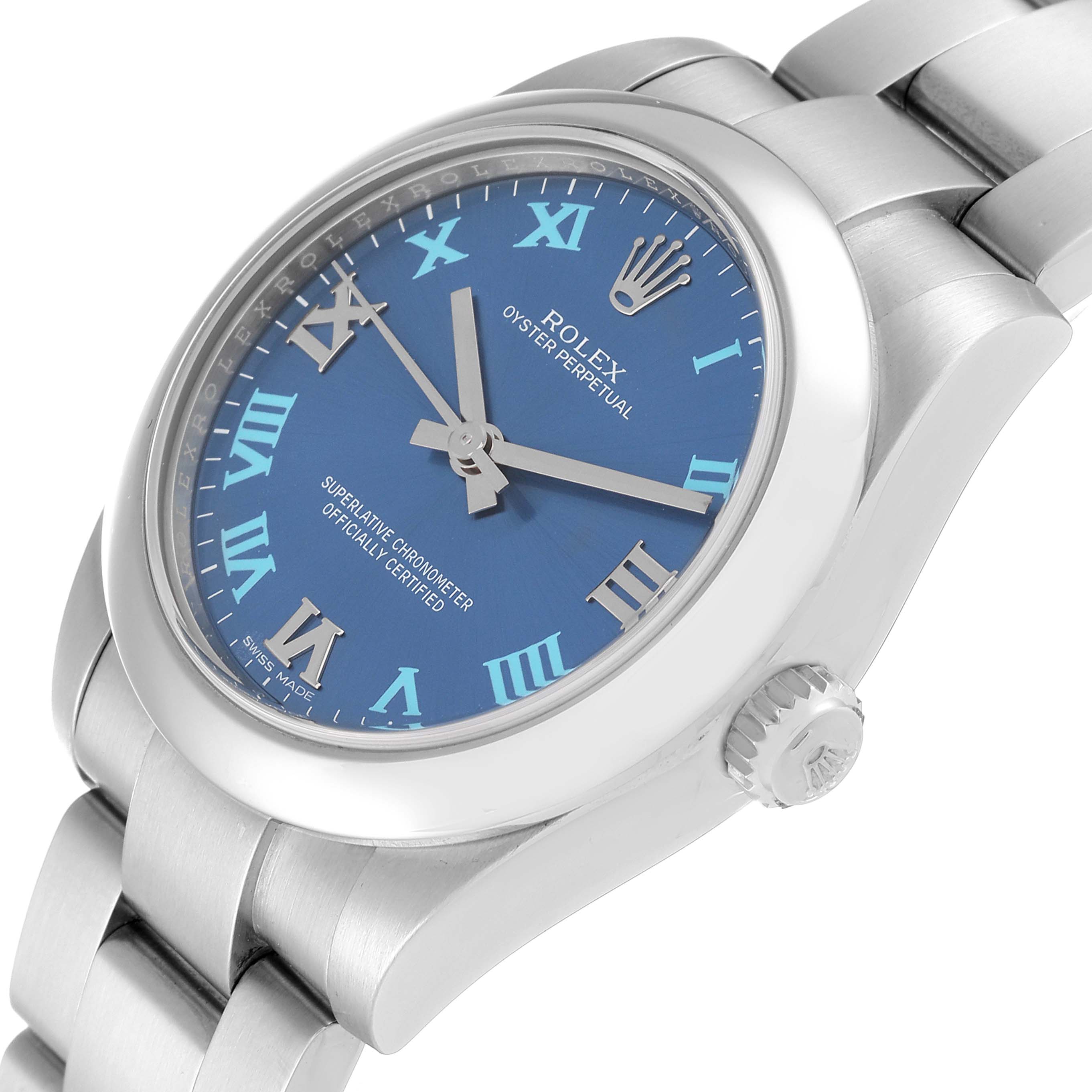 The image shows a Rolex Oyster Perpetual Mid-Size watch at an angle, displaying the blue dial, crown, and part of the bracelet.