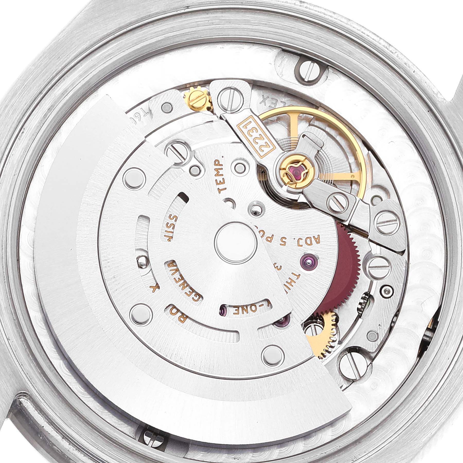 This image shows the movement mechanism of a Mid-Size Rolex watch from a back view angle.