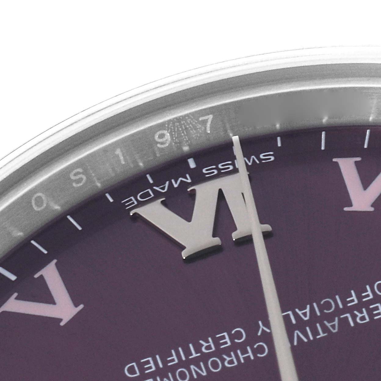 This is a close-up of the 7 o'clock position on the dial of a Mid-Size Rolex watch.