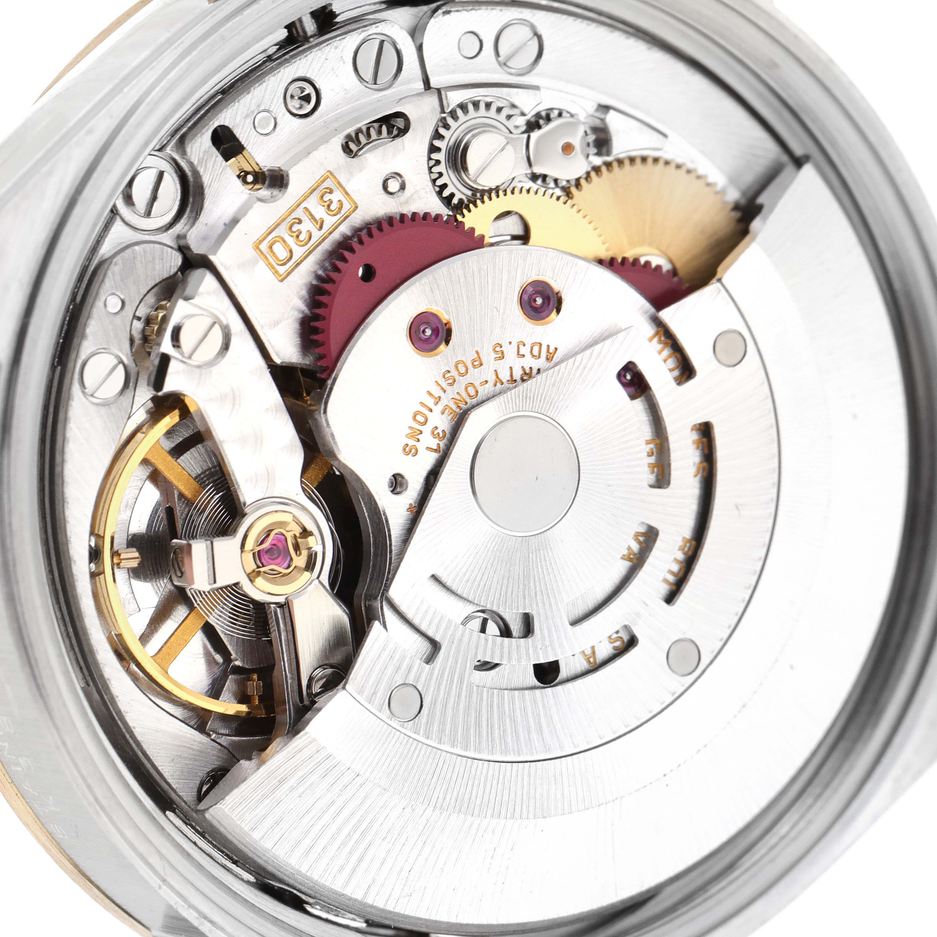 This is a close-up of the internal movement mechanism of a Rolex Oyster Perpetual 14233 Men's Steel and Gold (two tone) Grey Dial 14233 Men's Steel and Gold (two tone) Grey Dial watch, showing its gears and intricate parts.