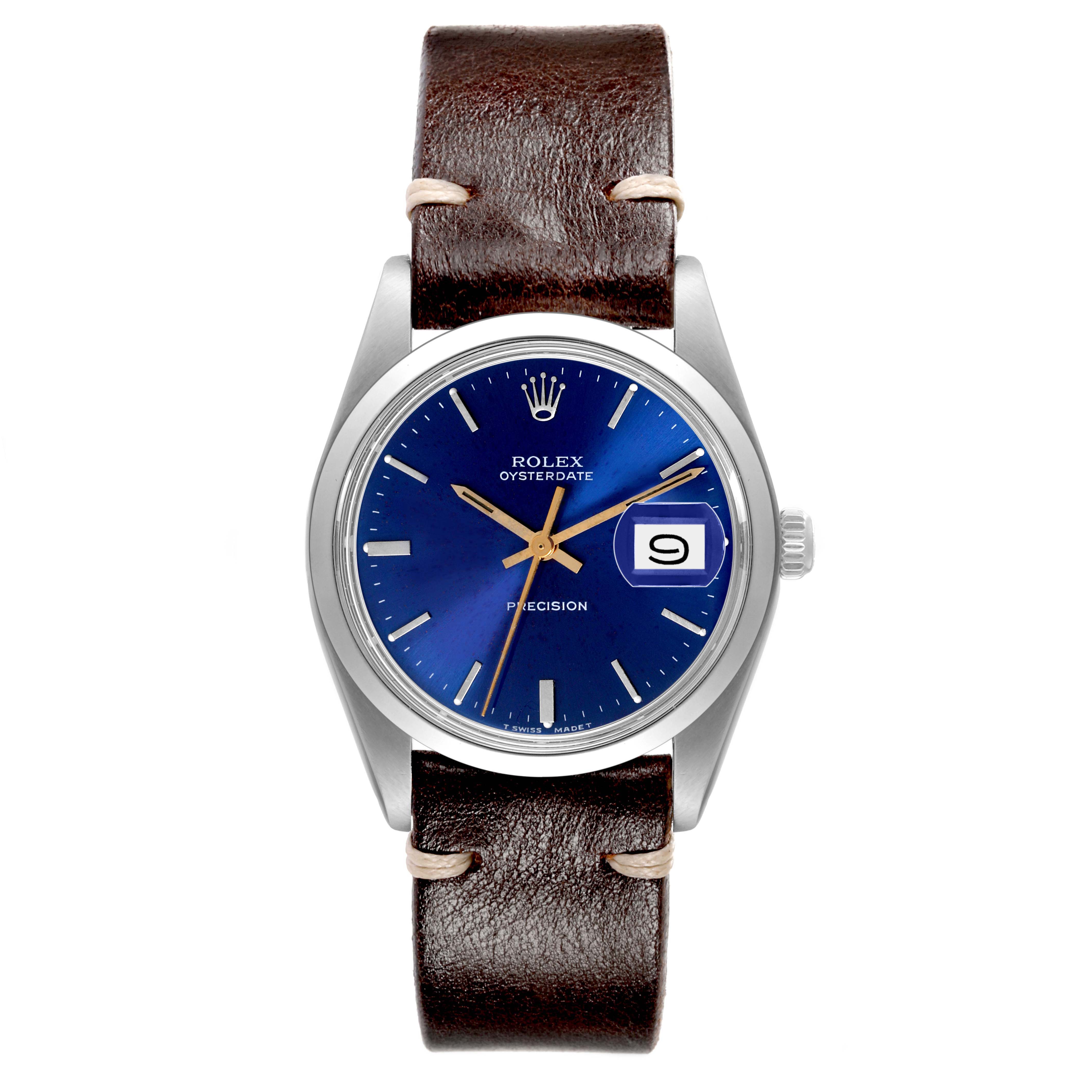 The image shows a front view of a Vintage Collection Rolex Oysterdate watch with a blue dial, leather strap, and date display at 3 o'clock.