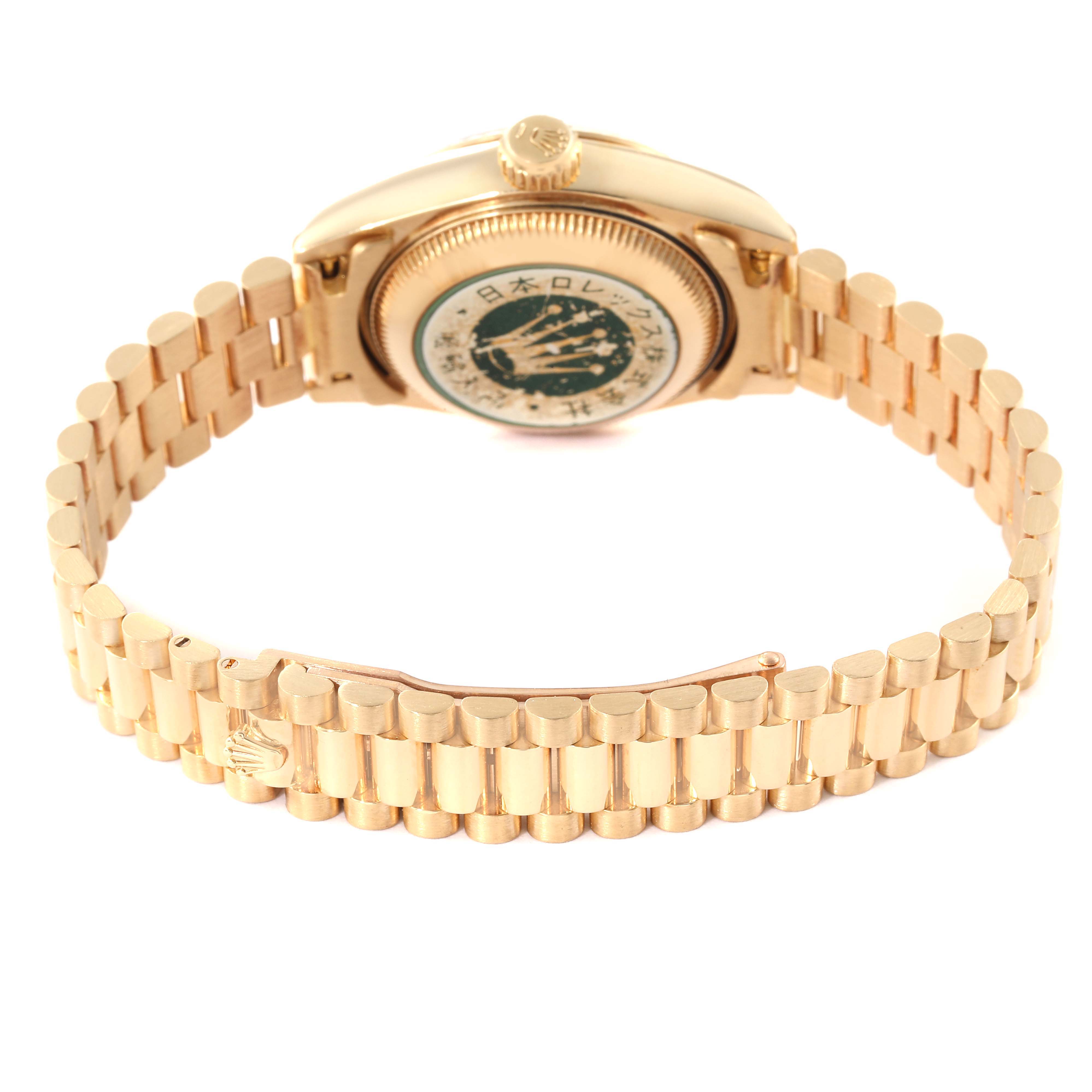 The Rolex President 69178 Women's Yellow Gold Champagne Dial 69178 Women's Yellow Gold Champagne Dial model watch is shown from the rear at an angle, highlighting its case back and gold bracelet.