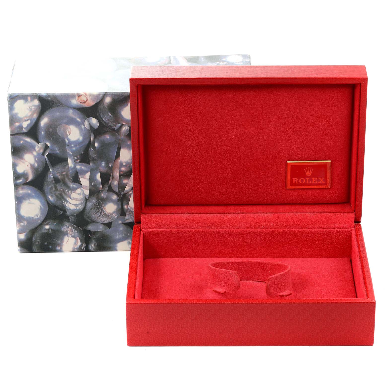 This image shows an open red Rolex watch box for the President model, with a separate outer box in the background.