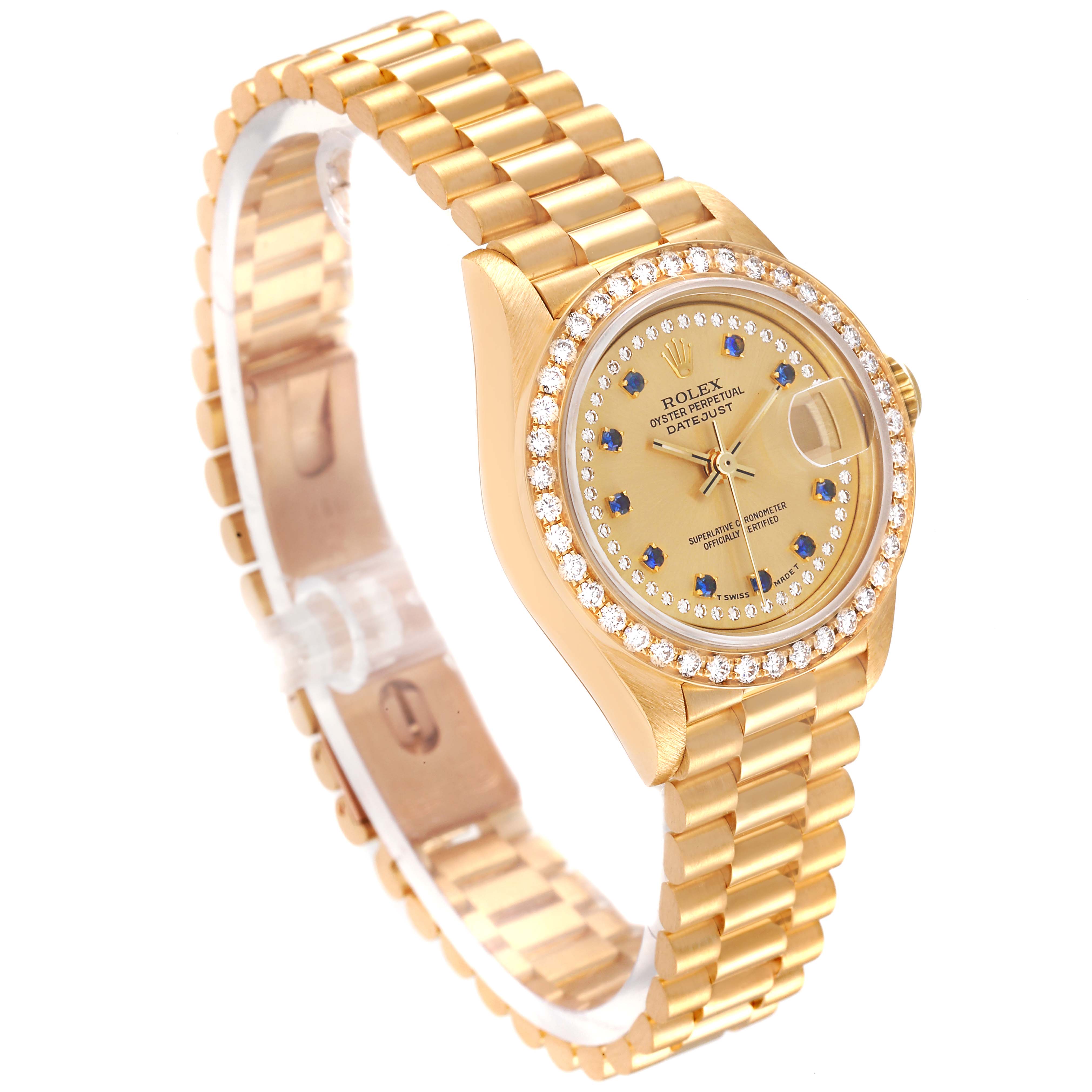 The image shows the Rolex President 69138 Women's Yellow Gold Champagne Dial 69138 Women's Yellow Gold Champagne Dial model watch at a three-quarter angle showcasing its face, bezel, and bracelet.
