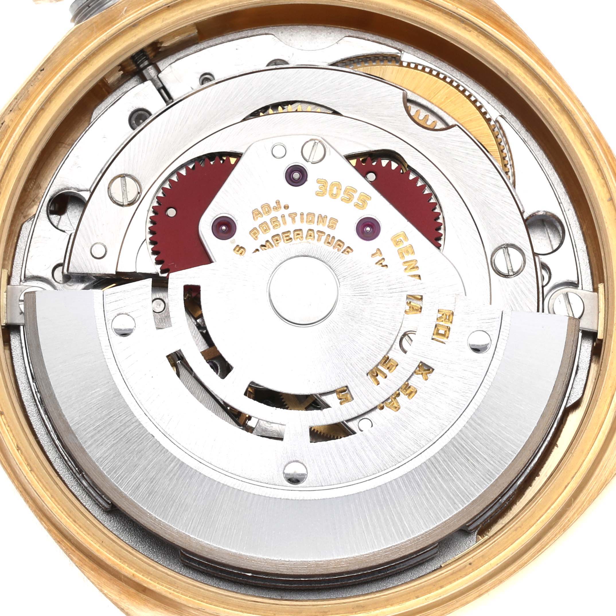 The image shows a close-up view of the internal mechanism of a Rolex President 18038 Men
s Yellow Gold Champagne Dial 18038 Men
s Yellow Gold Champagne Dial model watch.