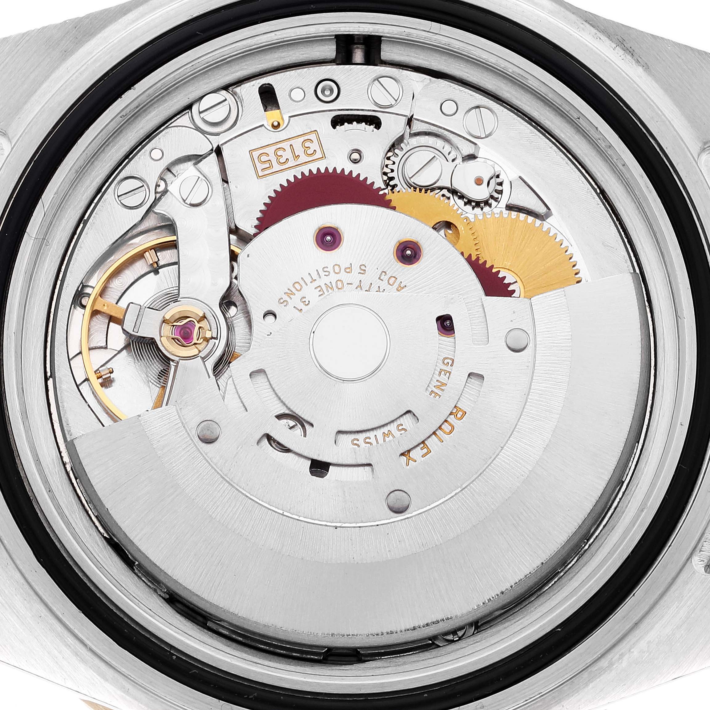 This image shows the internal mechanism of the Rolex Submariner 16613 Men's Steel and Gold (two tone) Blue Dial 16613 Men's Steel and Gold (two tone) Blue Dial watch from a top-down angle.