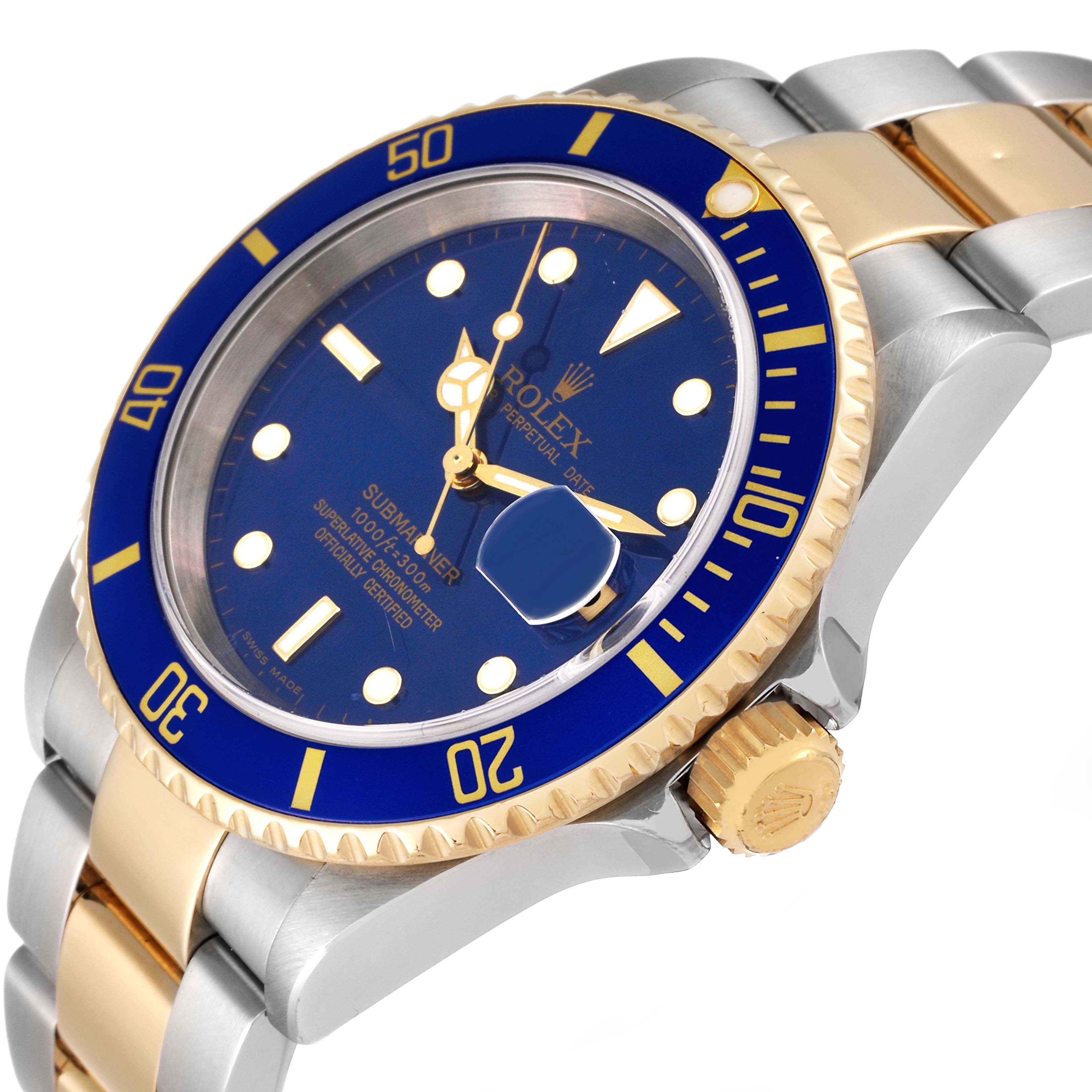 The image shows a side-angle view of a Rolex Submariner 16613 Men's Steel and Gold (two tone) Blue Dial 16613 Men's Steel and Gold (two tone) Blue Dial watch highlighting the bezel, dial, crown, and bracelet.