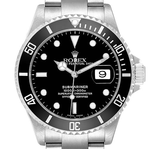 The image shows a front view of a Rolex Submariner watch, displaying the dial, bezel, crown, and part of the bracelet.