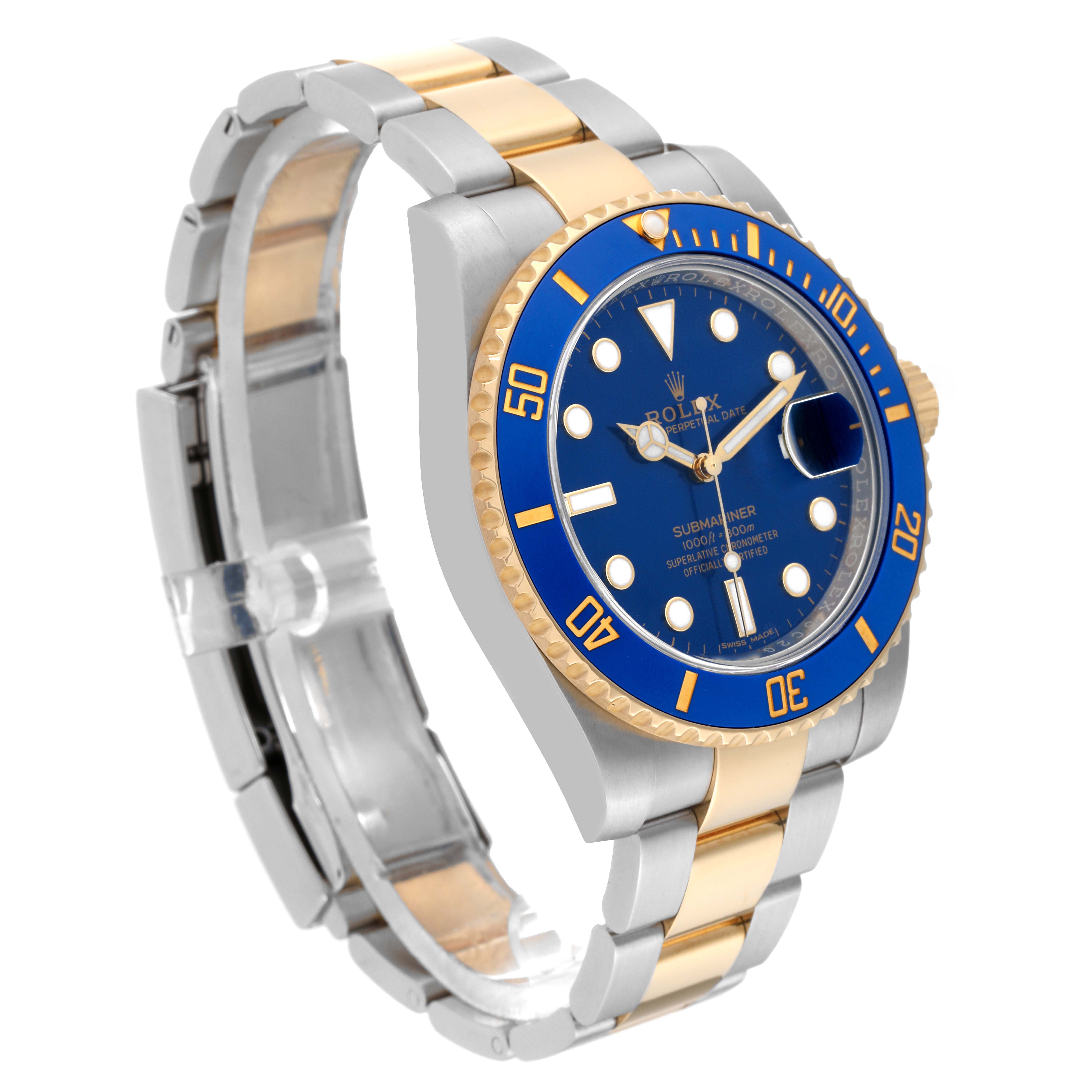 The image shows a Rolex Submariner 64733 Men's Steel and Gold (two tone) Blue Dial 64733 Men's Steel and Gold (two tone) Blue Dial watch with a blue dial, blue bezel, and two-toned bracelet, viewed at a slight angle from the front and side.