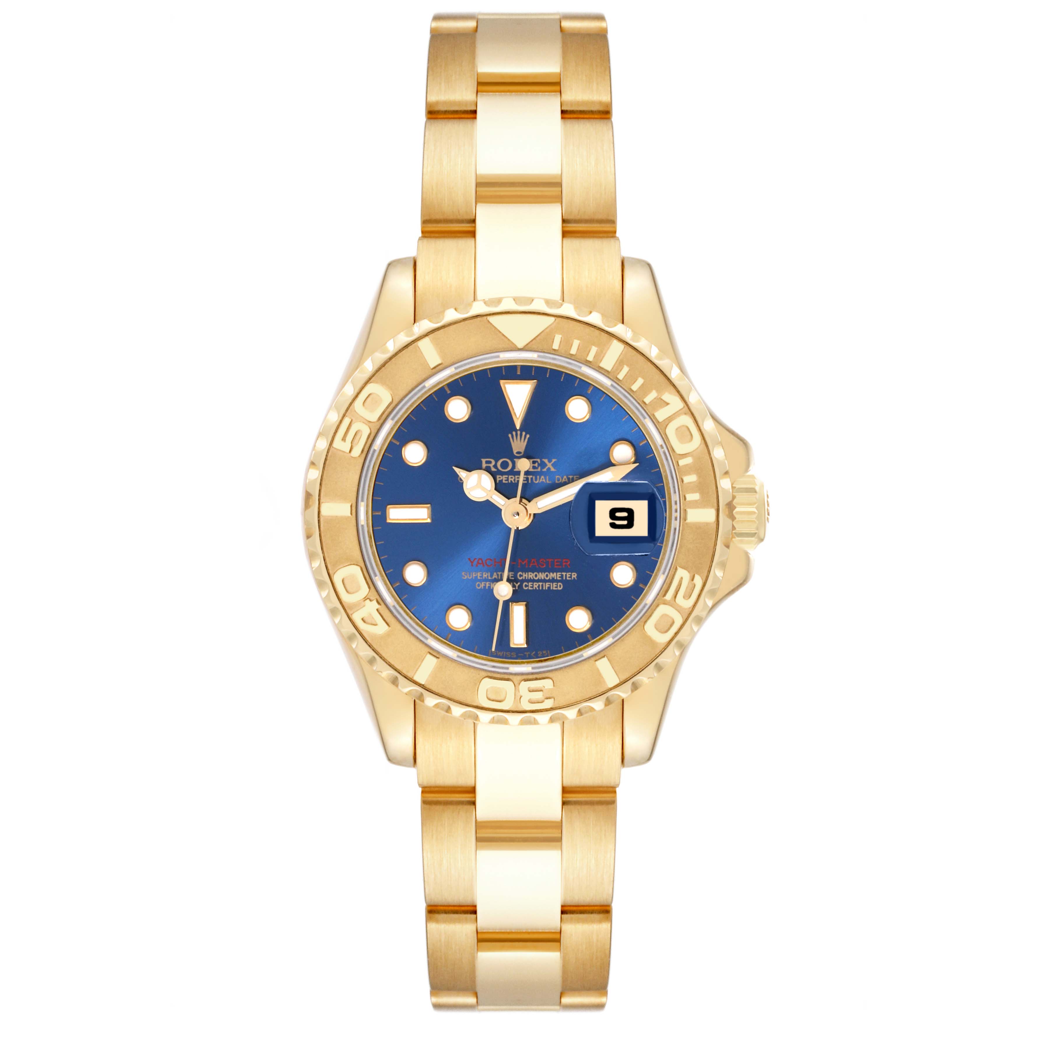 This Rolex Yacht-Master 69628 Women's Yellow Gold Blue Dial 69628 Women's Yellow Gold Blue Dial watch is shown from a top-down angle featuring its gold bracelet, blue dial, and bezel.