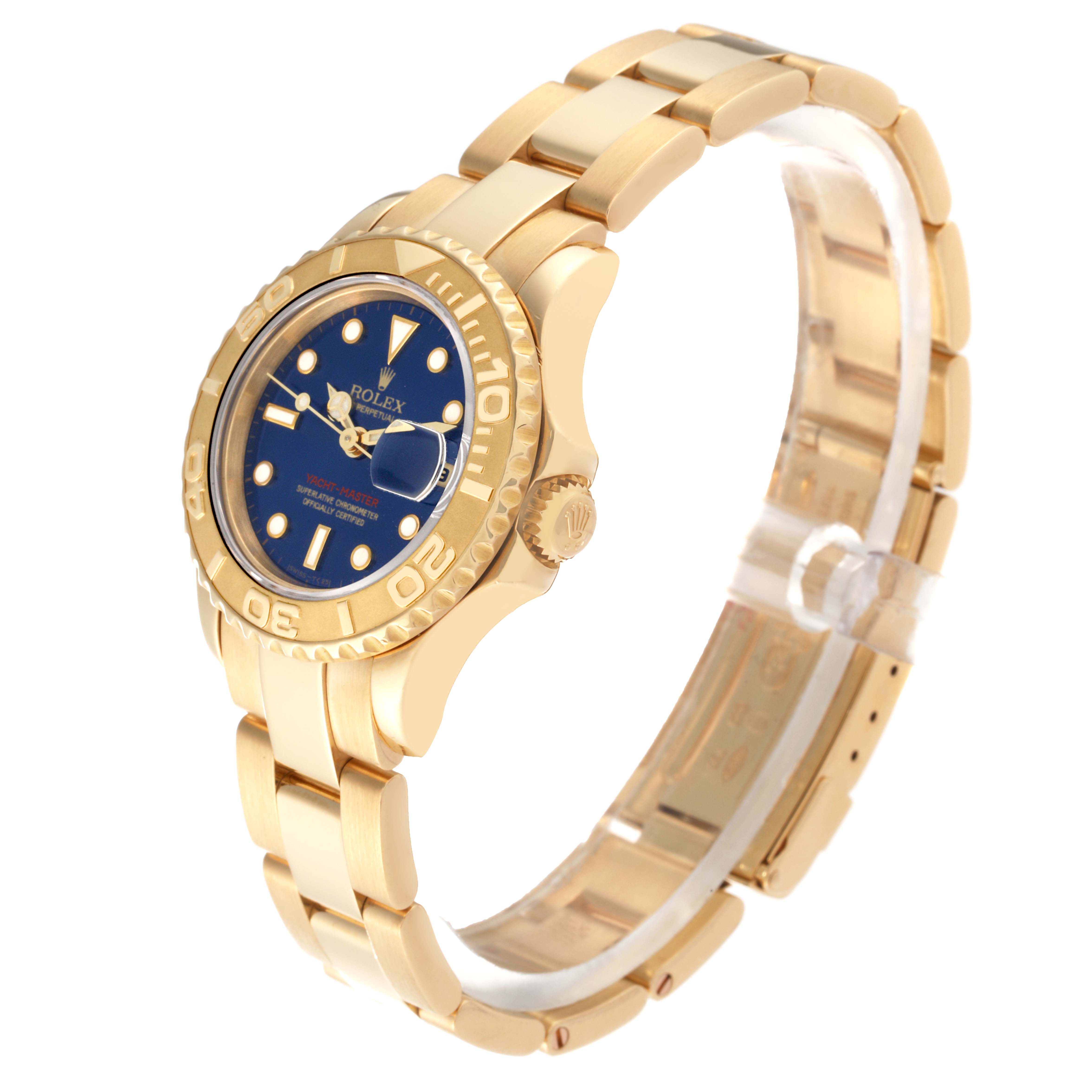 This Rolex Yacht-Master 69628 Women's Yellow Gold Blue Dial 69628 Women's Yellow Gold Blue Dial watch is shown at a 45-degree angle, highlighting the golden case, blue dial, and bracelet.
